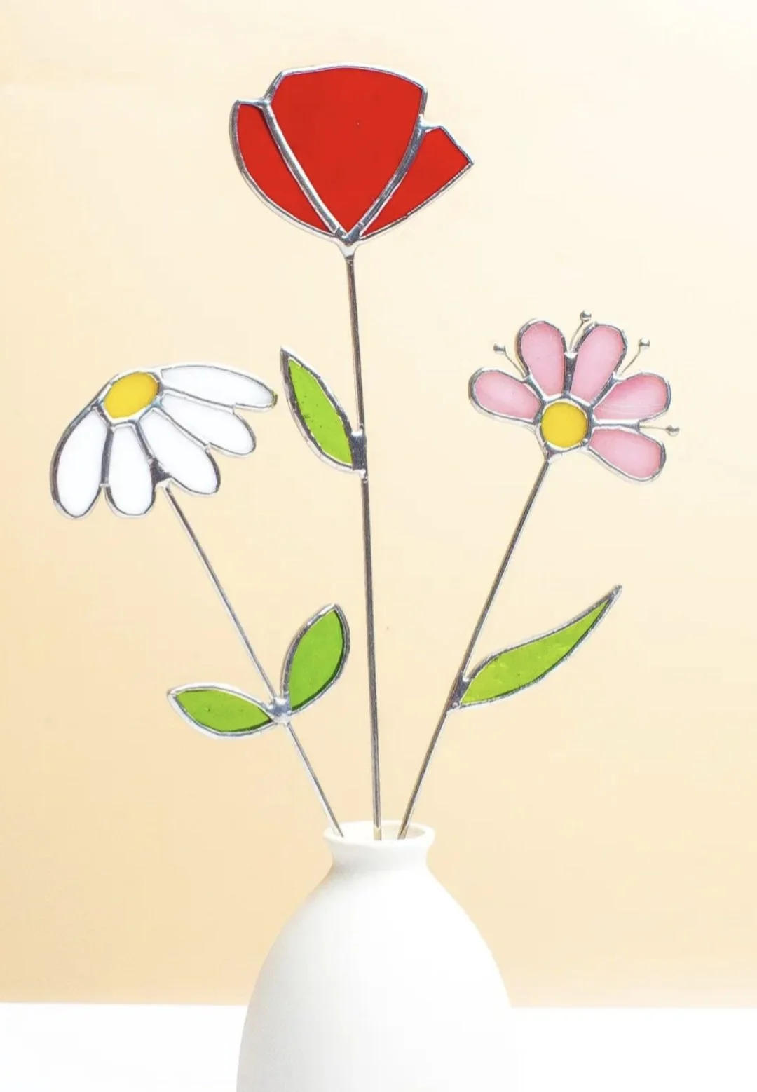 Example of three stained glass flower picks for an indoor vase.