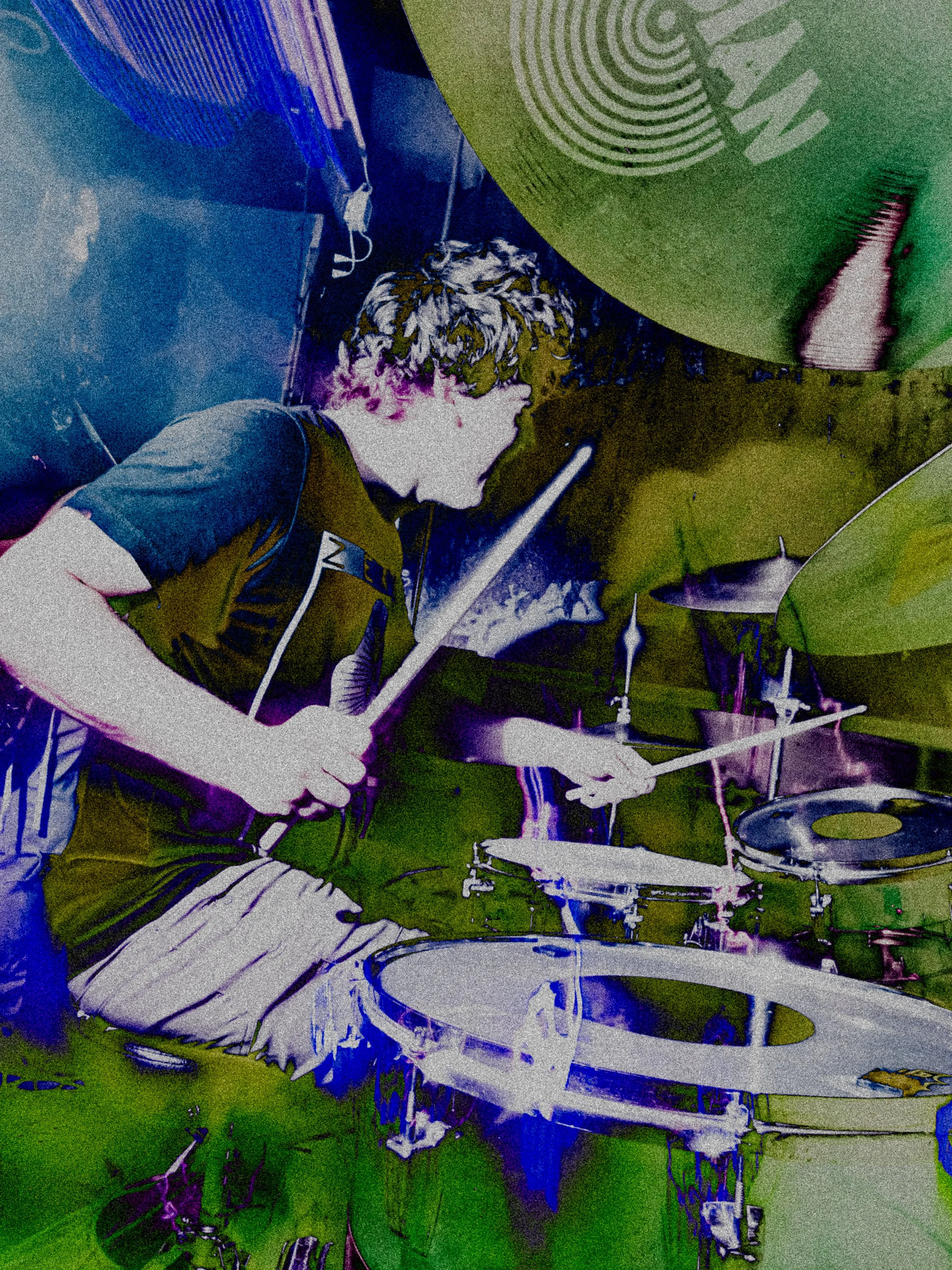 A young man playing drums on a drum set with a colorful, artistic filter