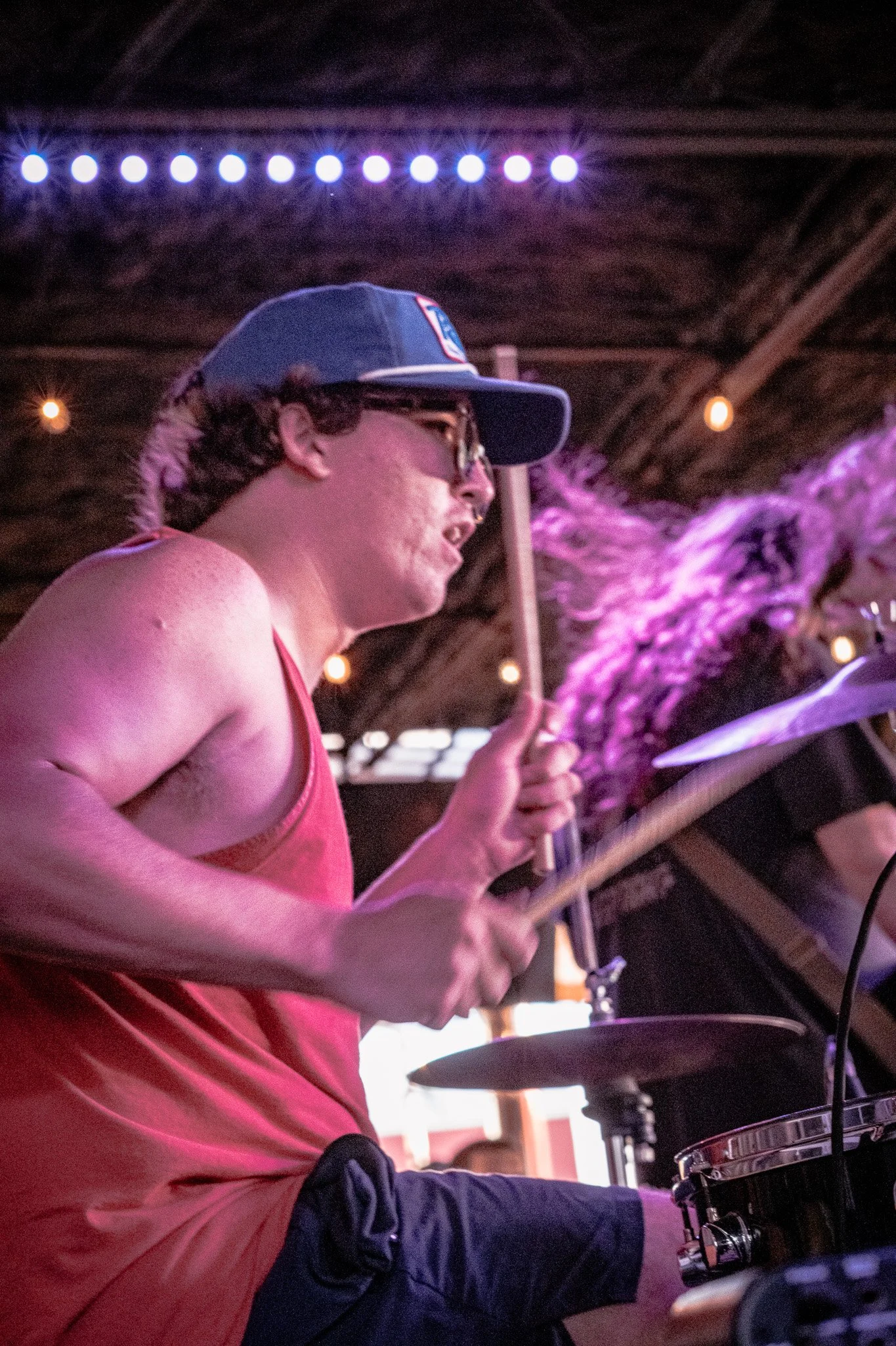 Liquid Pennies drummer Pierson Whicker performing at a bar, Cage Brewing in Saint Petersburg, Florida.