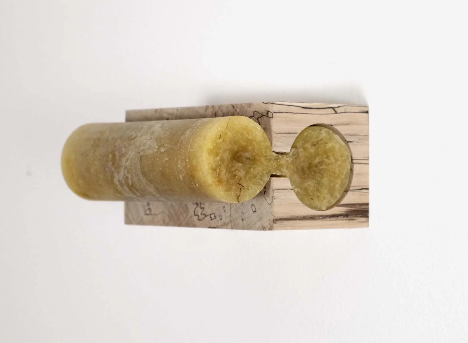 It Didn't Start With Me, 2025. Wood, wax, dandelions, and keyhole hanger, 6 x 3 x 5 in  (15 x 7.5 x 12.5 cm)