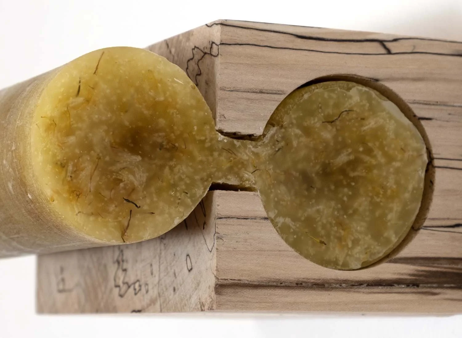 It Didn't Start With Me, 2025. Wood, wax, dandelions, and keyhole hanger, 6 x 3 x 5 in  (15 x 7.5 x 12.5 cm)