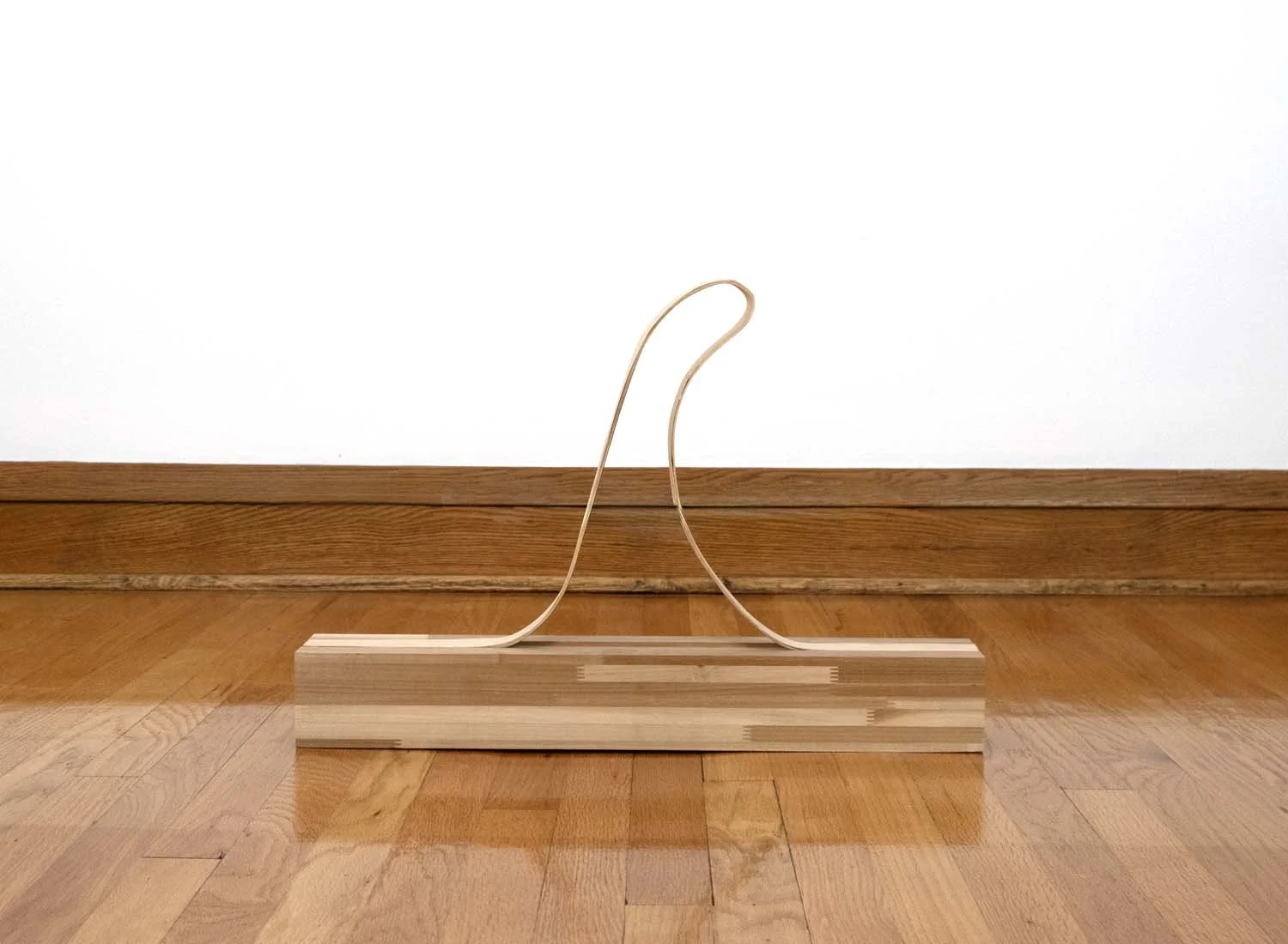 Trigger, 2025. Wood, 23 ½  x 16 x 4 in  
(60 x 41 x 9.5 cm)