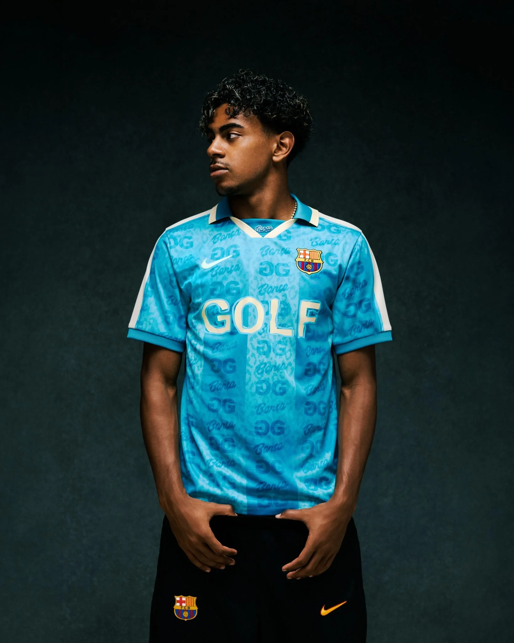 Lamine Yamal wearing the turquoise FC Barcelona × GOLF WANG jersey.