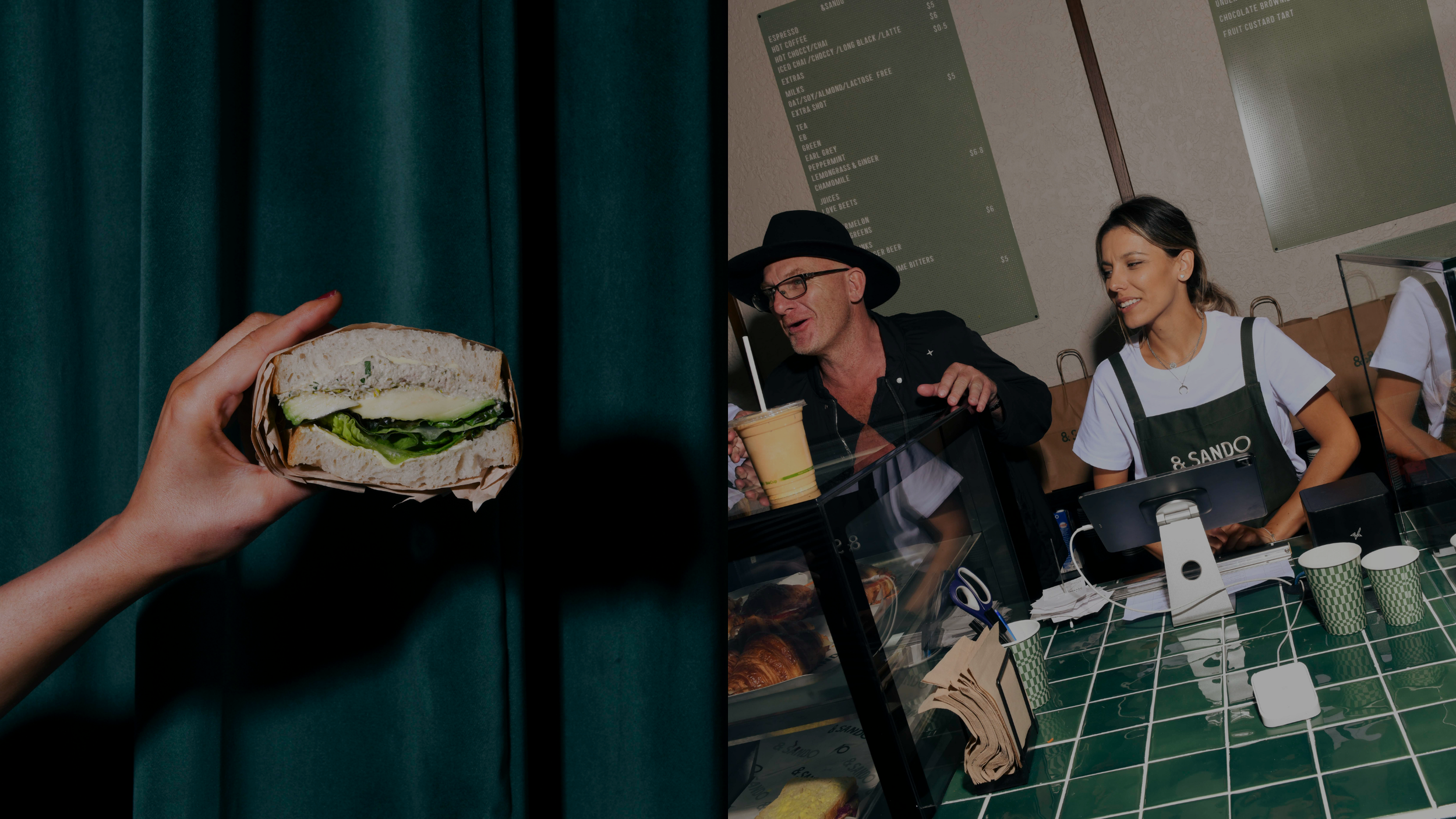 A hand holding a sandwich with lettuce and turkey against a green curtain on the left. On the right, two people, a man wearing a black hat and glasses, and a woman in an apron, are at a food counter with a green menu board behind them.