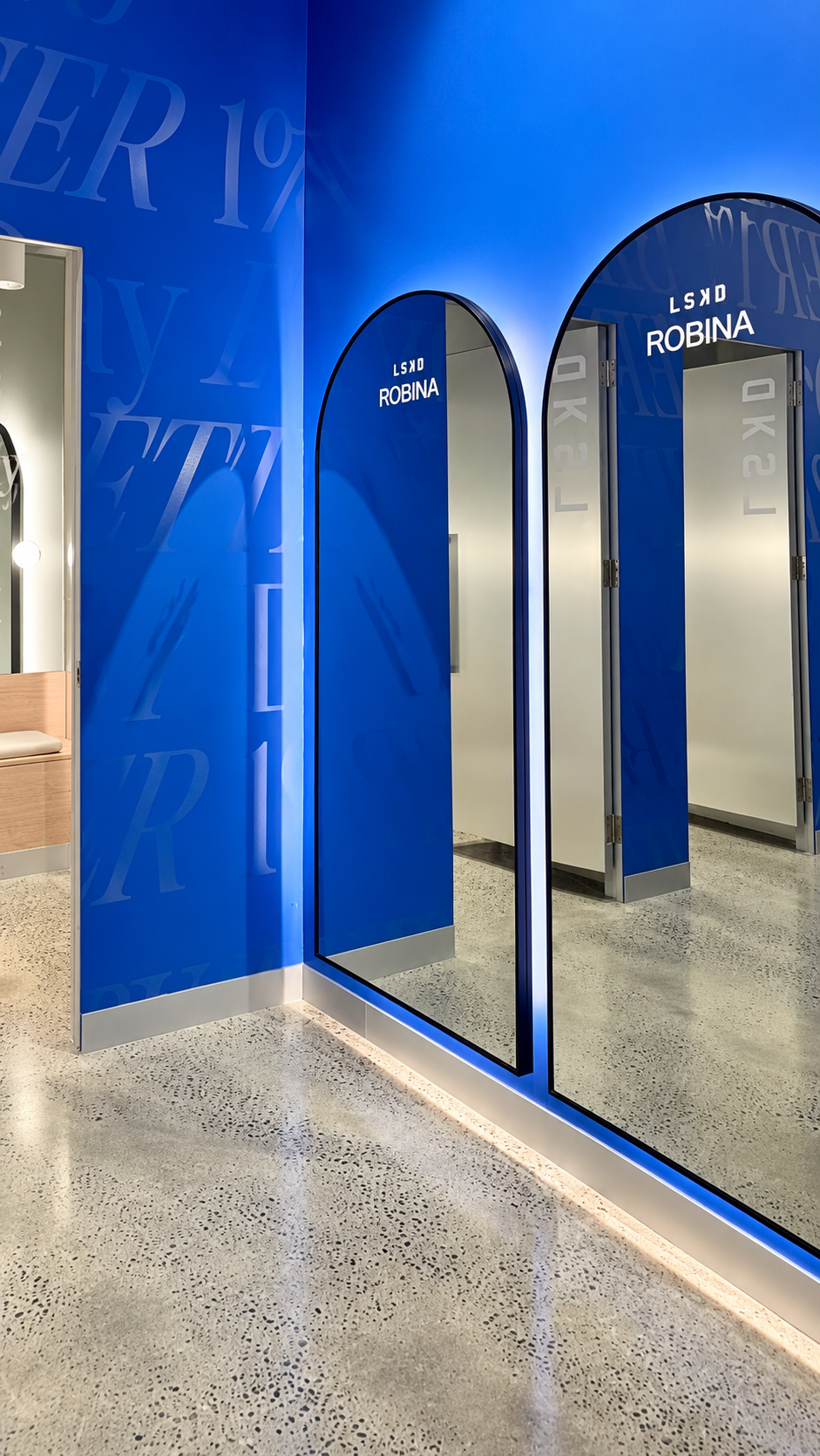 Detail of the blue arched mirror forms at LSKD Robina.