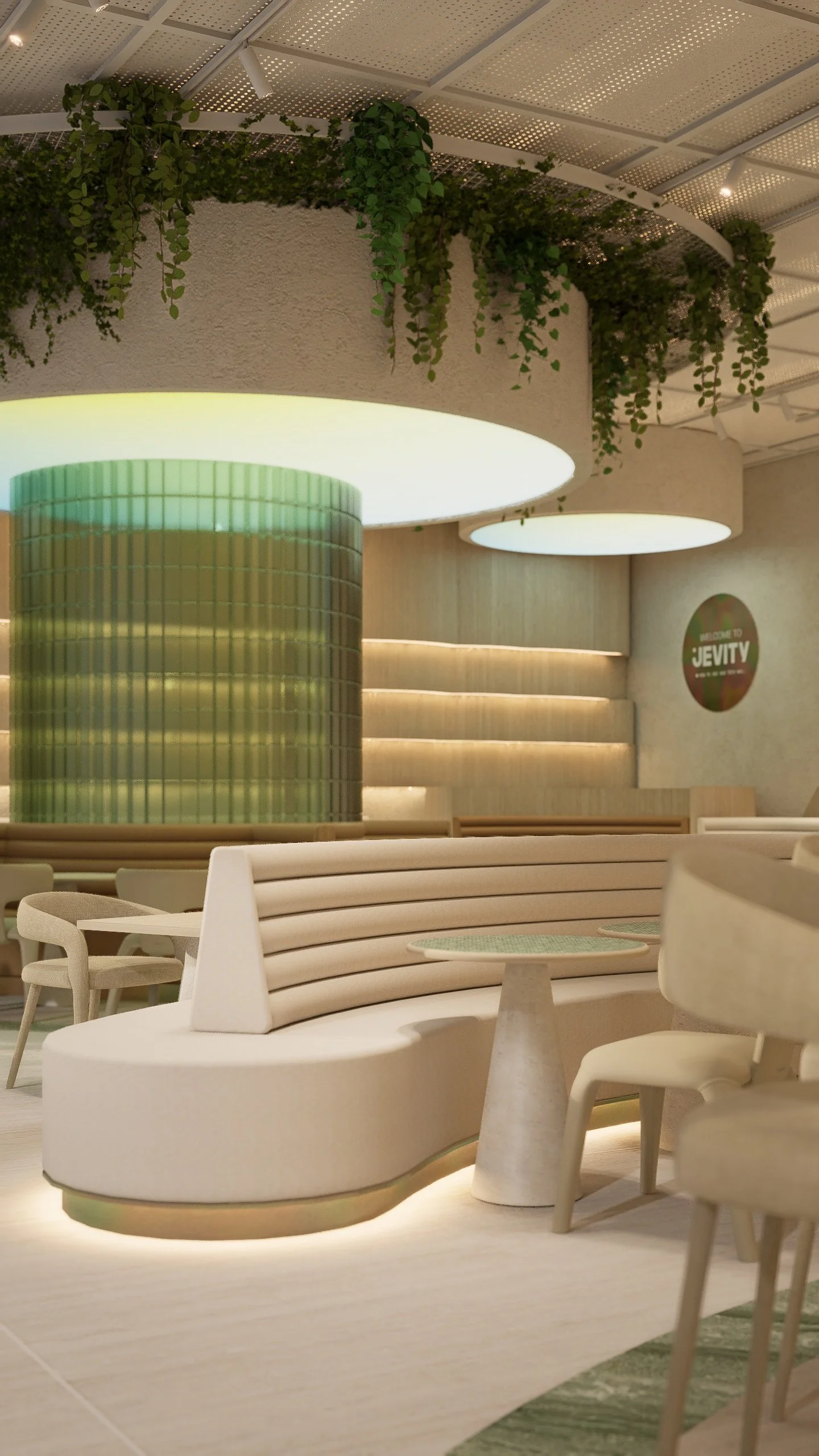 Modern, stylish cafe interior with cream-colored curved seating, light wood tables, green foliage hanging from the ceiling, and warm lighting, with a sign that says "Welcome to JEVITY" in the background.