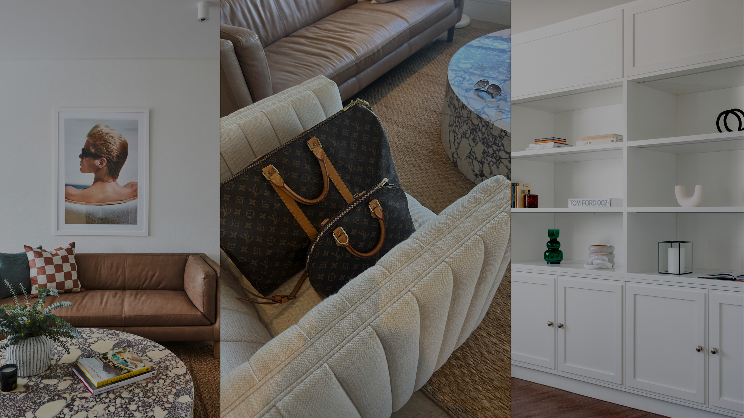 Interior of a modern living room with a brown leather sofa, a white wall art of a woman with short hair wearing sunglasses, a checkered pillow, a marble coffee table with a book and a plant, a beige armchair with a Louis Vuitton bag and small pouch o