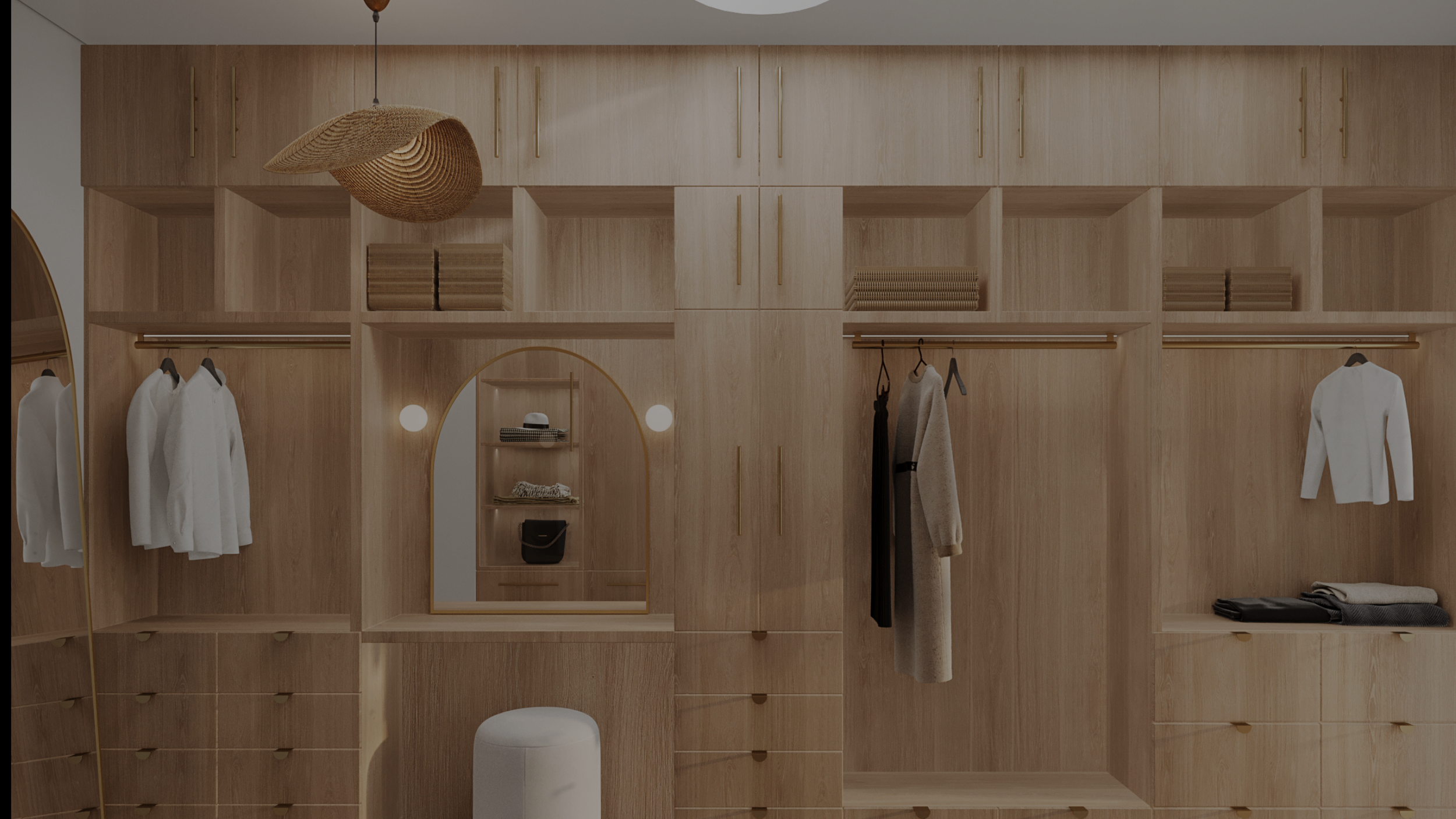 Empty wooden walk-in closet with hanging clothes, shelves, a mirror, and a wicker pendant light.