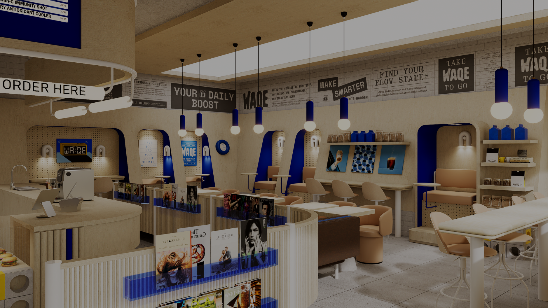 Interior of a modern coffee shop with a counter for orders, seating areas with beige chairs, blue decorative panels, and wall signage with coffee-related quotes and instructions.
