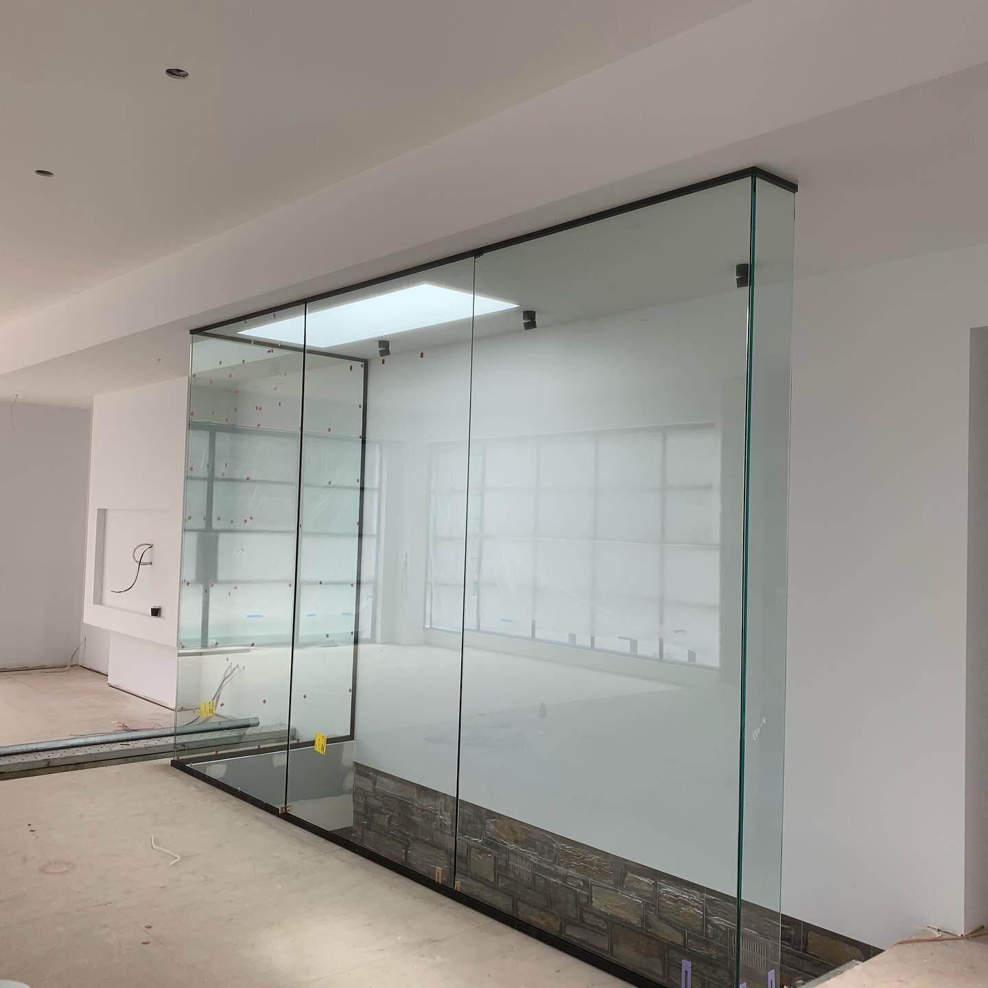 Bespoke glass wine cellar nearing completion 🔹🔹 #framelessglass #adelaidedesign