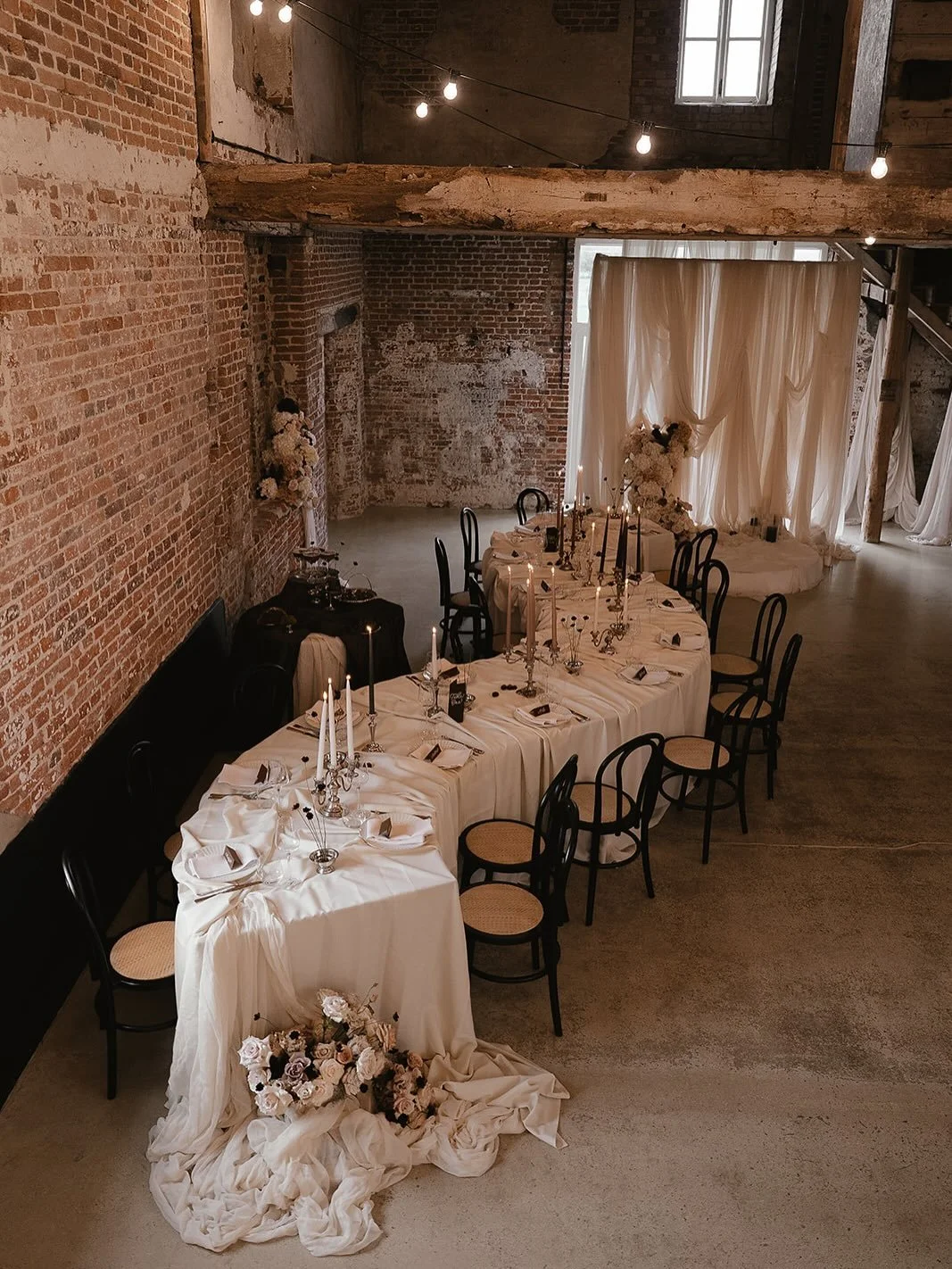Taking this morning slow, reflecting on this winding tablescape and draped ceremony backdrop scatter with vintage silverware, mocca and chocolate candlesticks and the most delicate dishes of cosmos at @godwickweddings this Autumn with some super tale