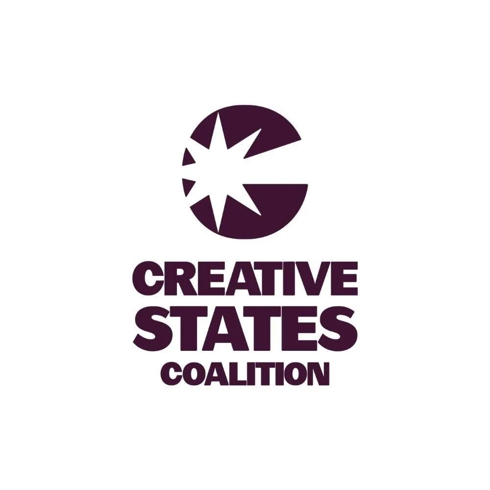 A with a starburst icon with the words Creative States Coalition in dark purple/green font with each word stacked on the other