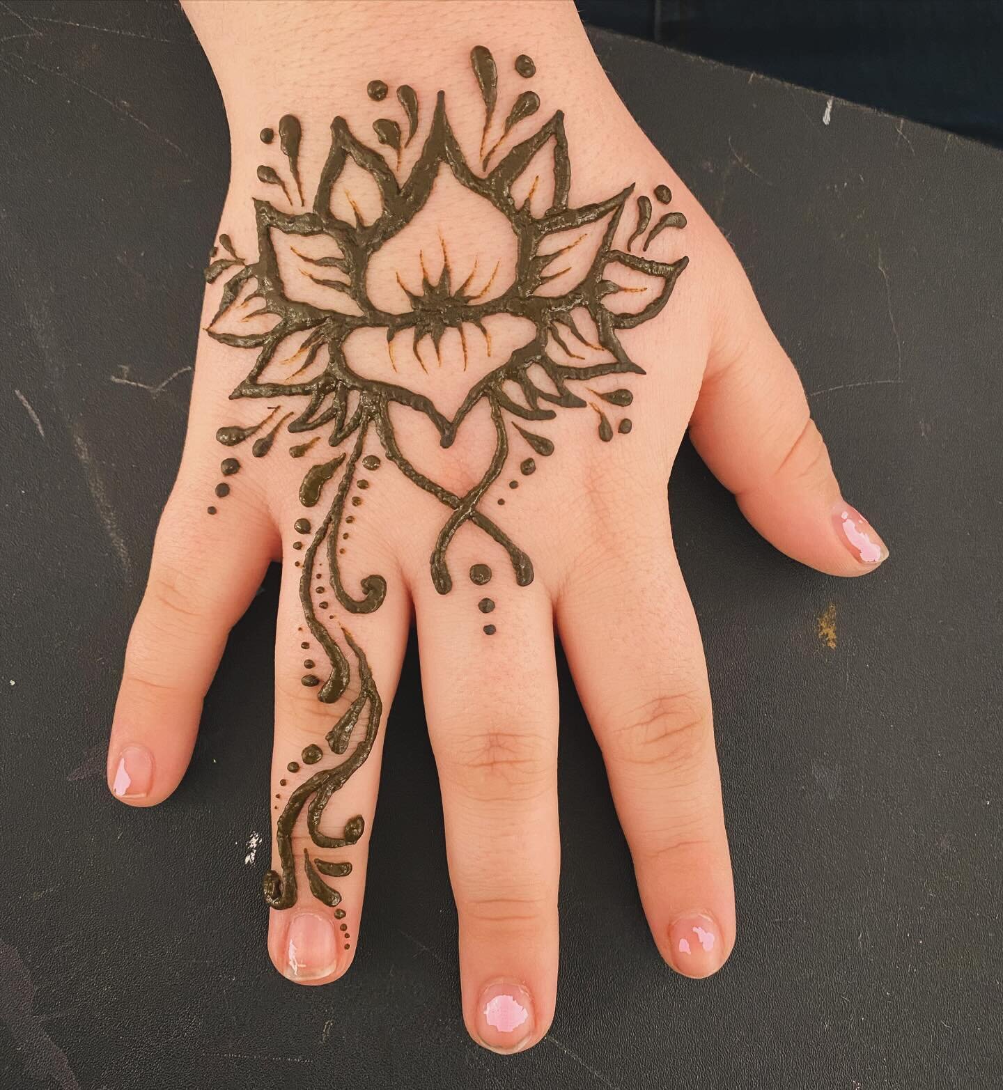 Did you know we do henna tattoos??

We use all natural henna that we make ourselves! That way we know exactly what goes into it. 

We do custom designs and have our own designs to choose from at our festival booths and our private party/events! Hire 