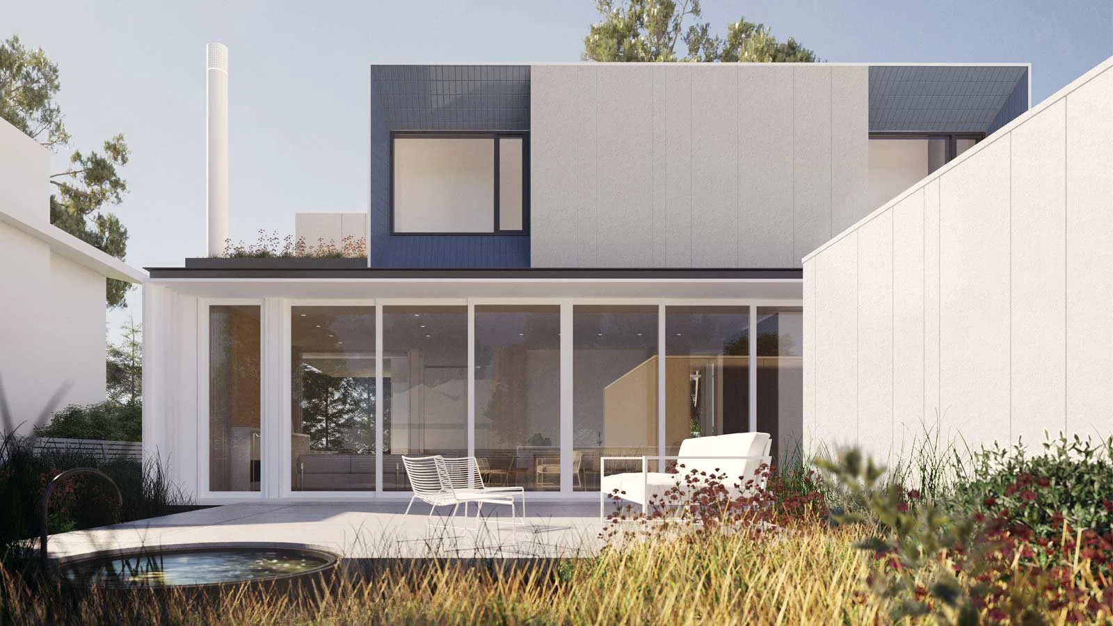 Modern two-story house with large glass windows, patio furniture, and landscaped yard.