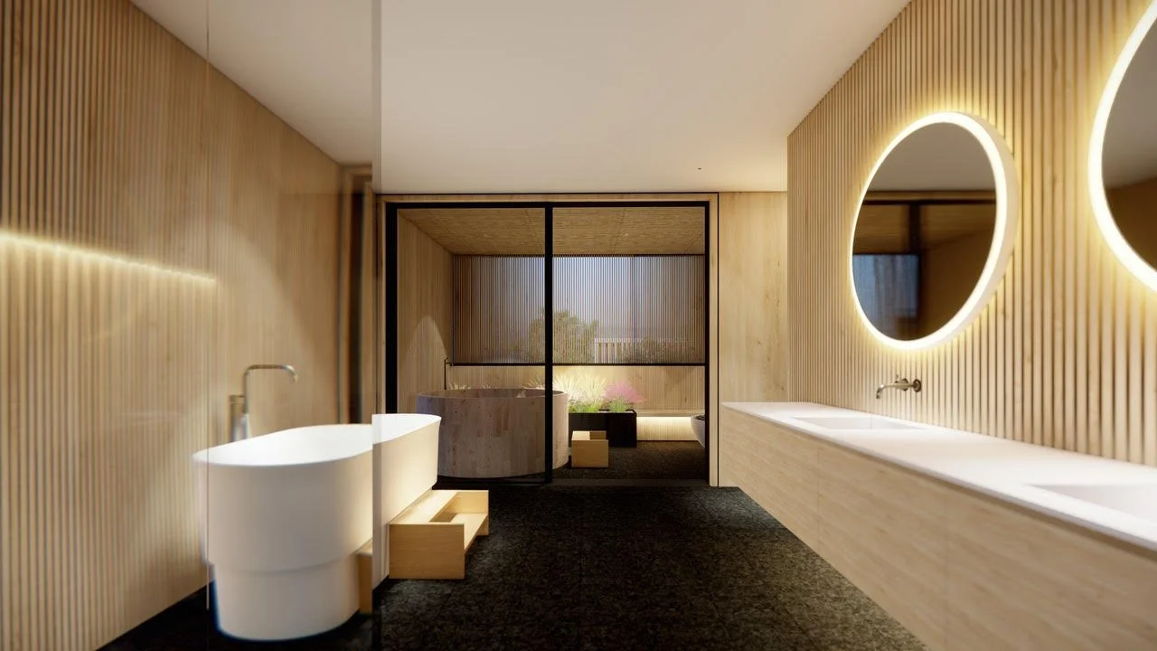 Modern bathroom with wooden wall paneling, oval mirrors with backlit edges, a large white bathtub, two sinks with wall-mounted faucets, and a private outdoor bath area visible through a glass partition.