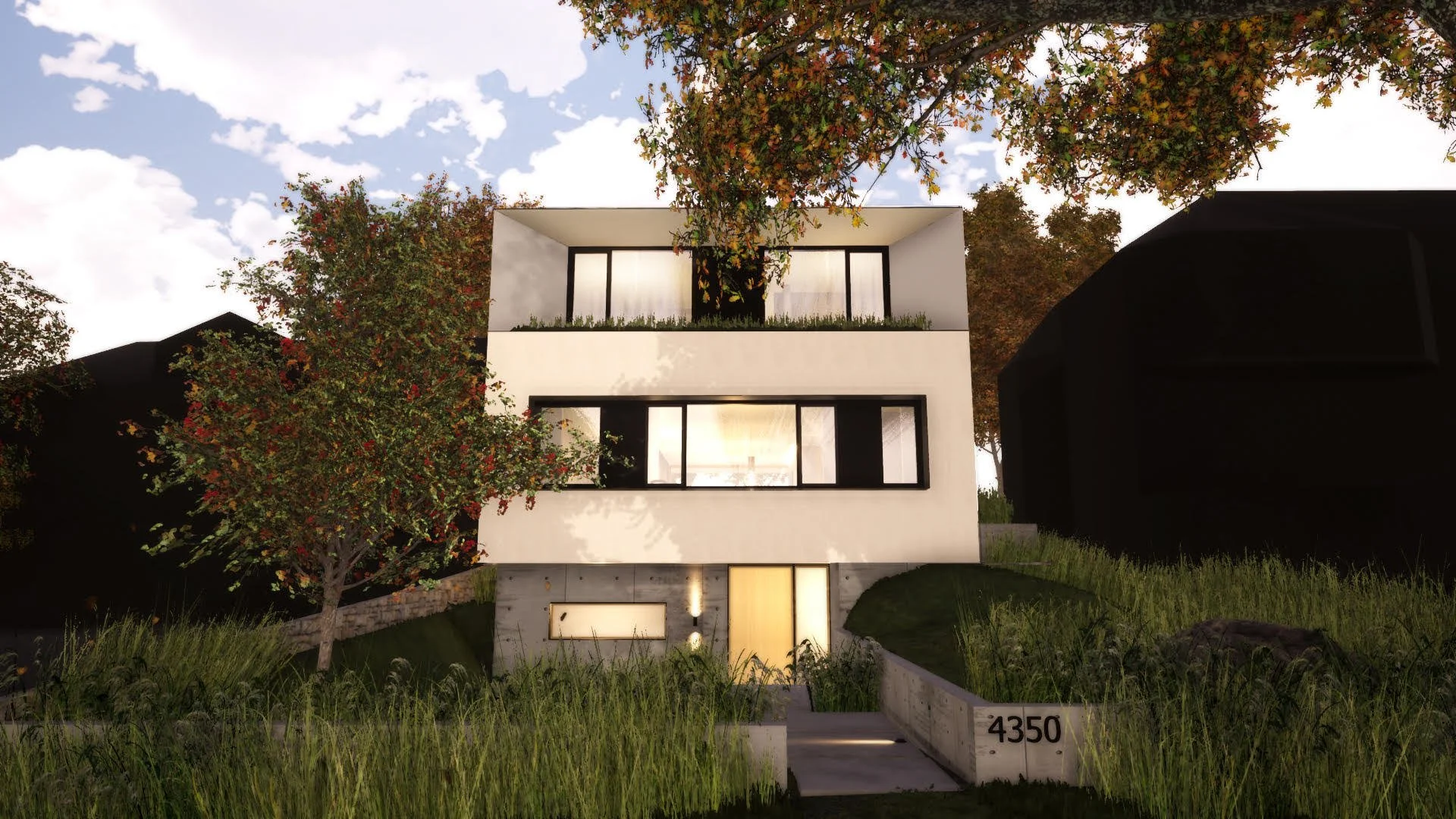 Modern white three-story house with large windows, green plants on the balcony, surrounded by trees with some autumn leaves, introduced by a concrete walkway at the address 4350.