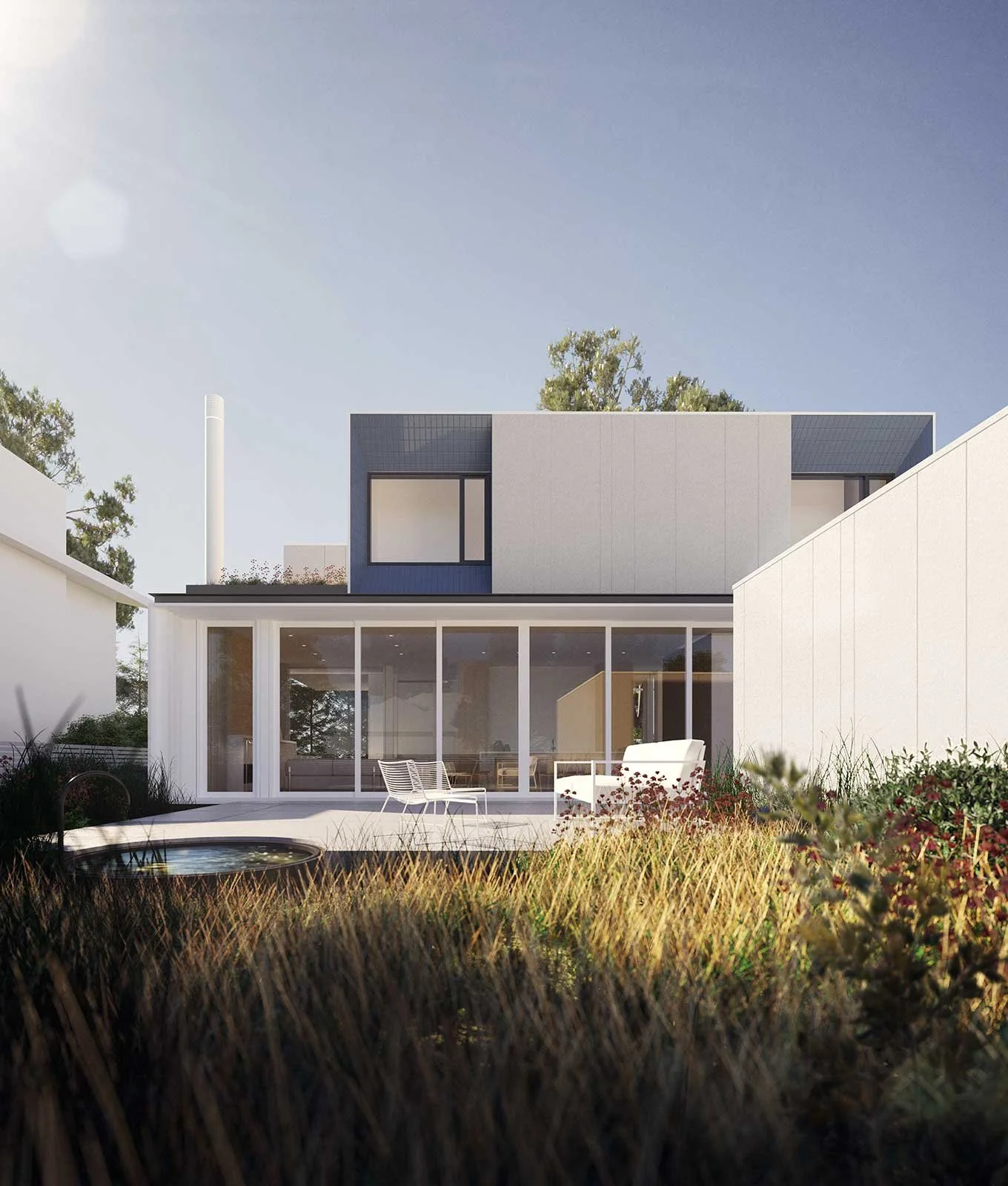 Modern house with large glass windows, outdoor seating, a small round pool, and garden grass in the foreground under a clear sky.