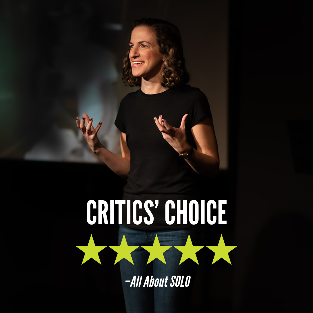 A woman speaking on stage in a black T-shirt. The text on the image reads 'CRITICS' CHOICE' with five green stars below and 'All About SOLO' underneath.