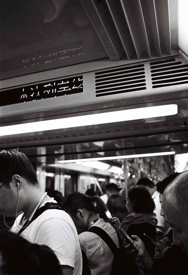 Crowded people in the packed subway.jpeg
