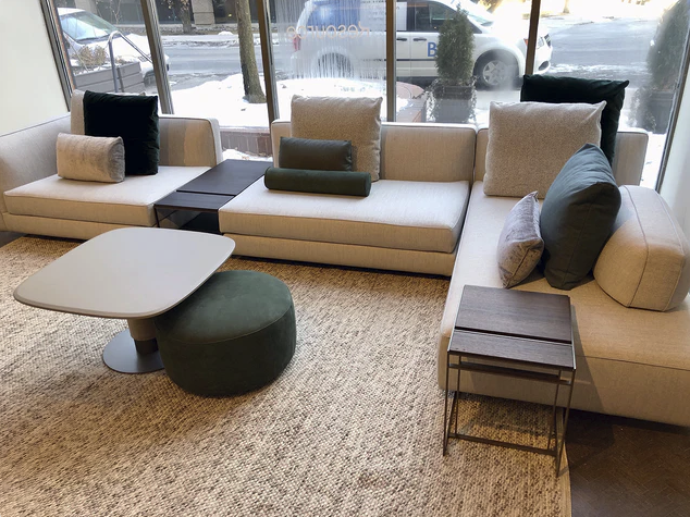 Modular couch in sandy ceam colour by Resource Furniture in Toronto.