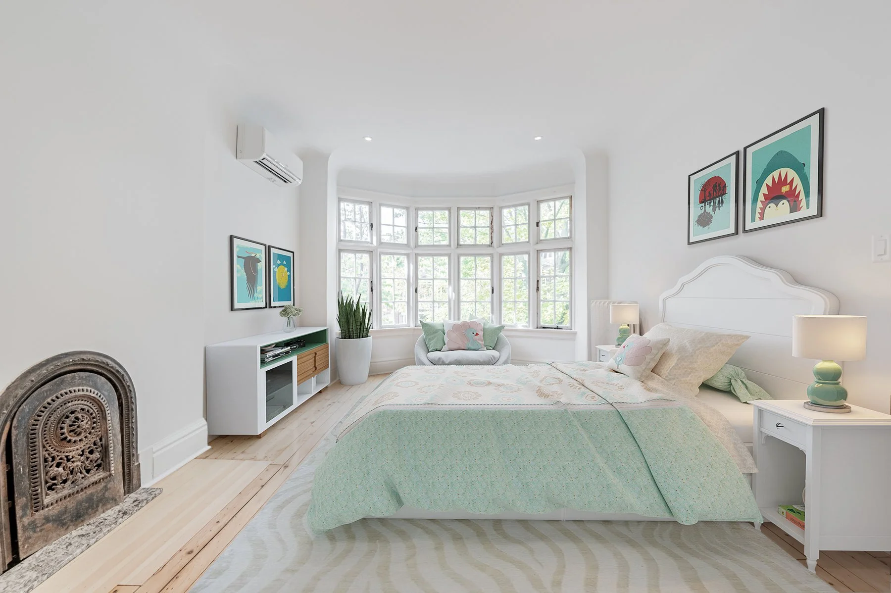 Heritage home in Bloor West Toronto renovated by Lighthaus Built. Curved front window with vintage arched fireplace insert.