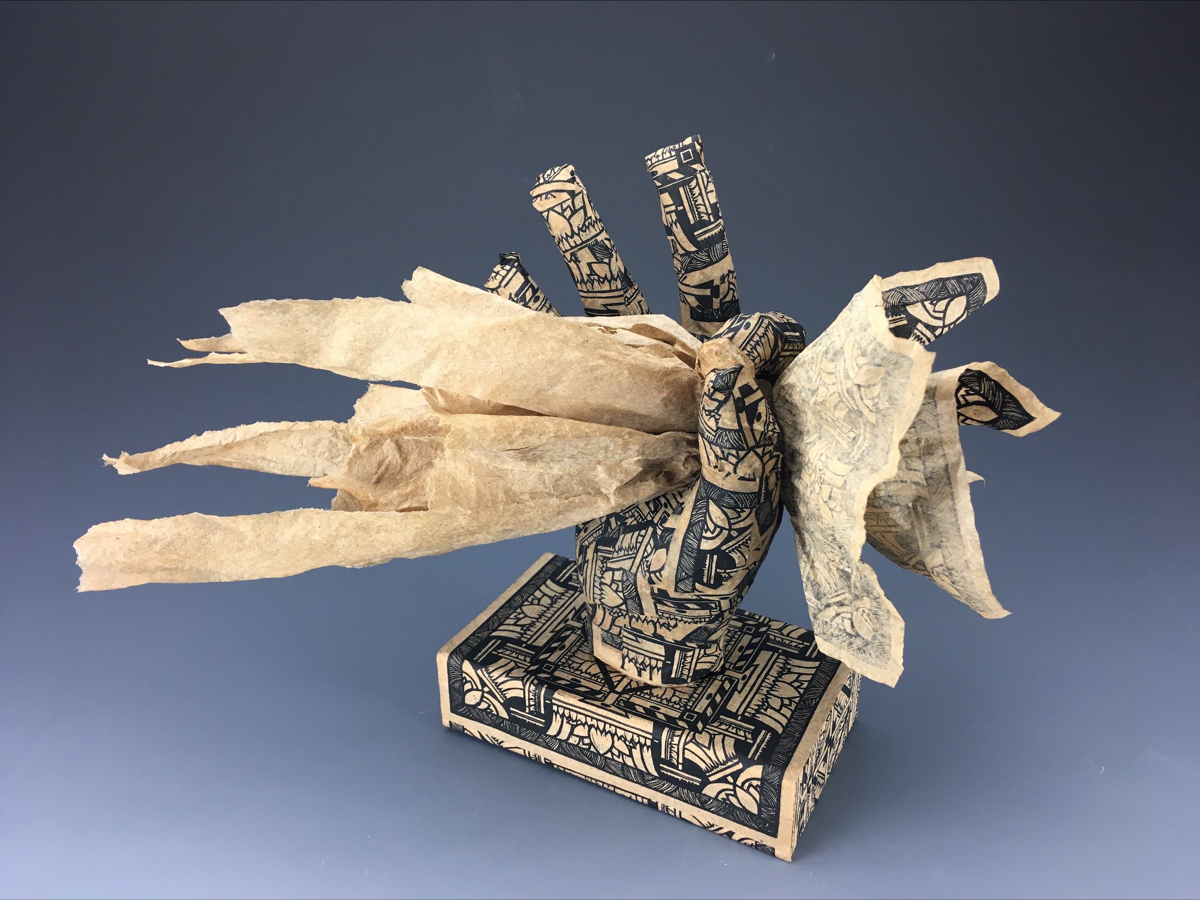 Threshold, 2022, Paper mache made of linocut on paper towel