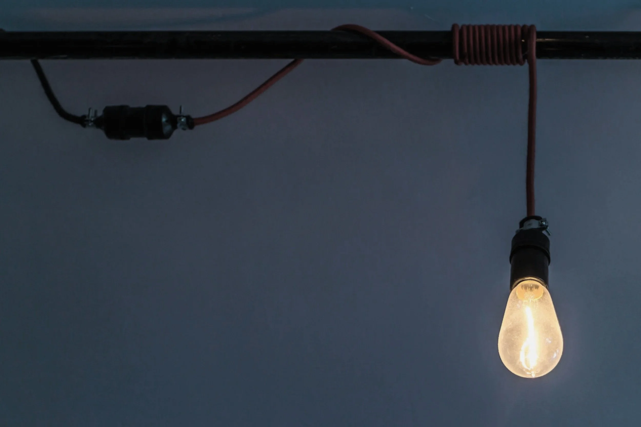 Lightbulb representing B Corp and ISO frameworks.