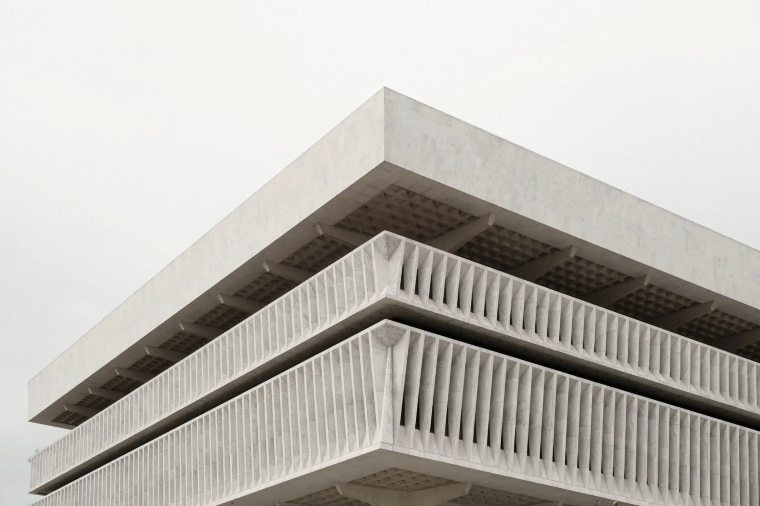 Brutalist bulding representing the sustainability work the consultancy does in architecture and design, including planning and energy strategy, retrofit, listed building, and full RIBA Stage delivery.