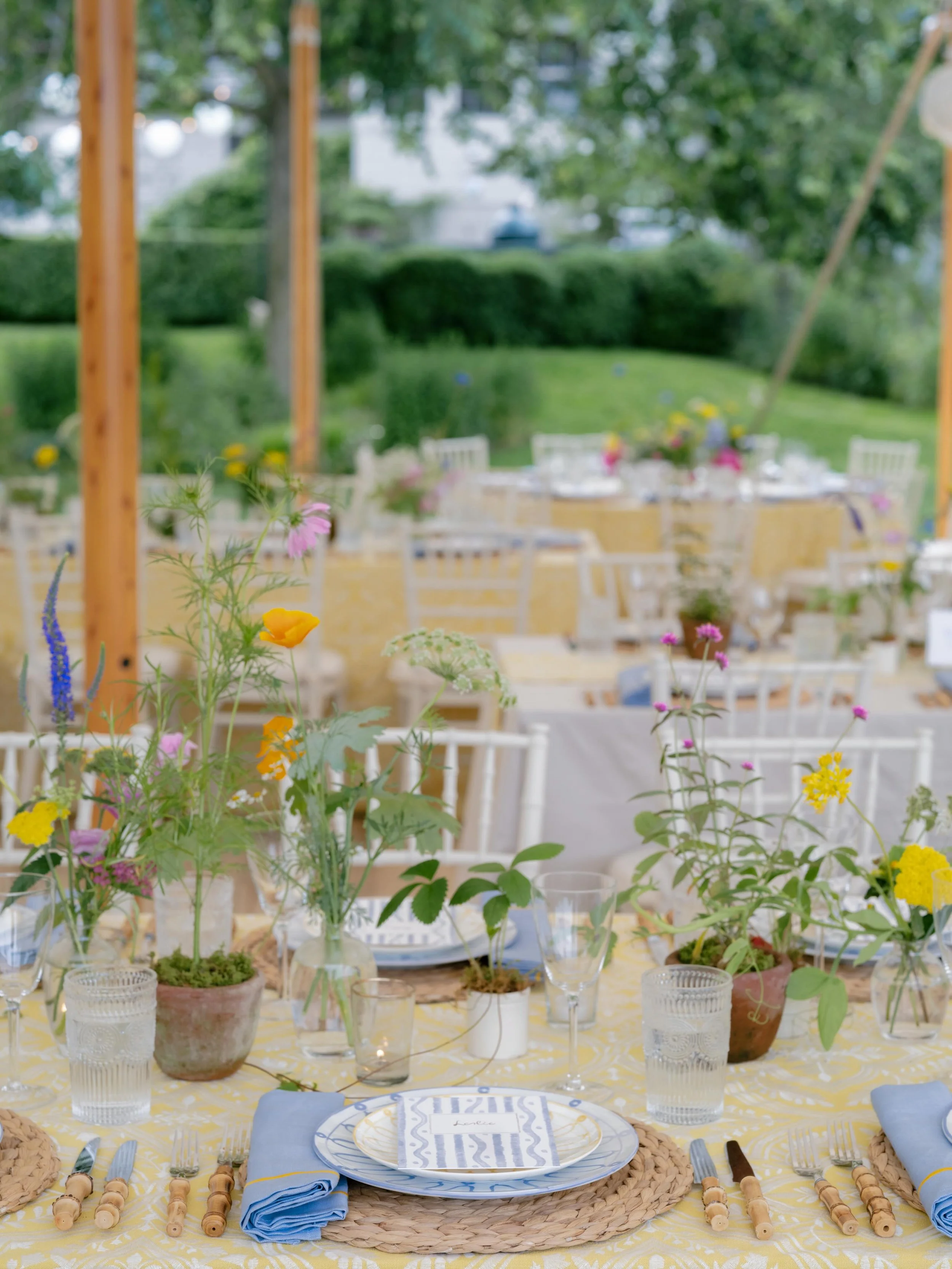 Summer entertaining layered with wildflowers, candlelight, and long tables designed to feel like home. From the hand-painted details to the natural garden florals, every element of this summer wedding felt beautifully undone.
