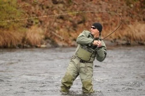 US Army Veteran Ira Strouse hooked into a steelhead with project healing waters