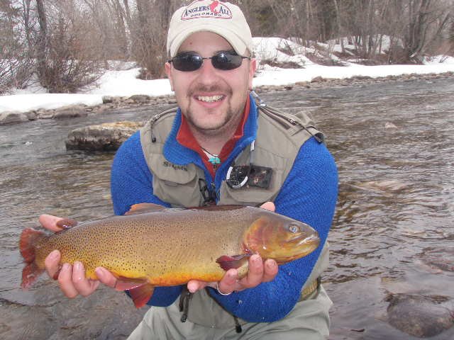 Tom with a big cutthroat on the Blue River caught on a micro egg in March