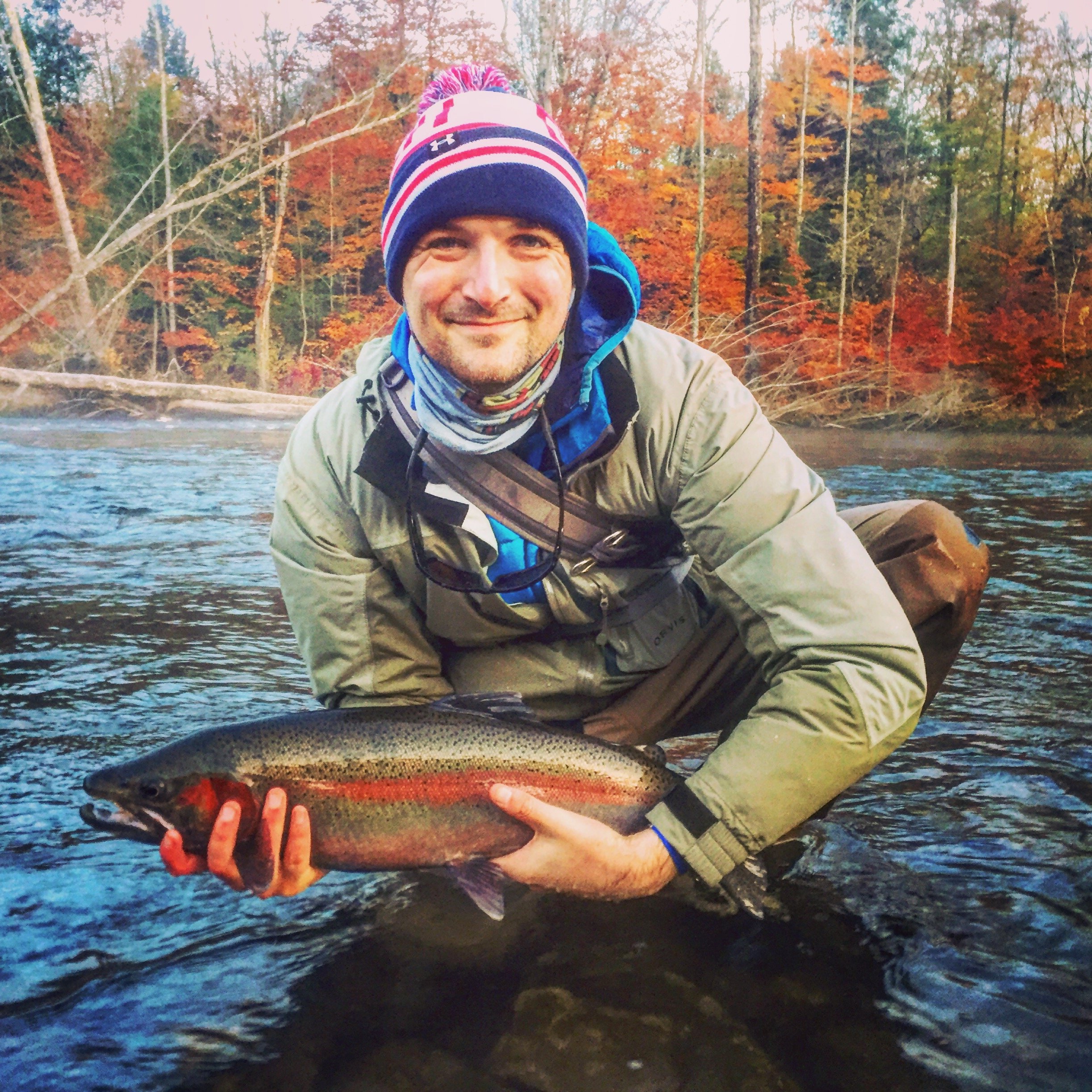 Thomas with an early morning caught steelhead on a popsicle fly
