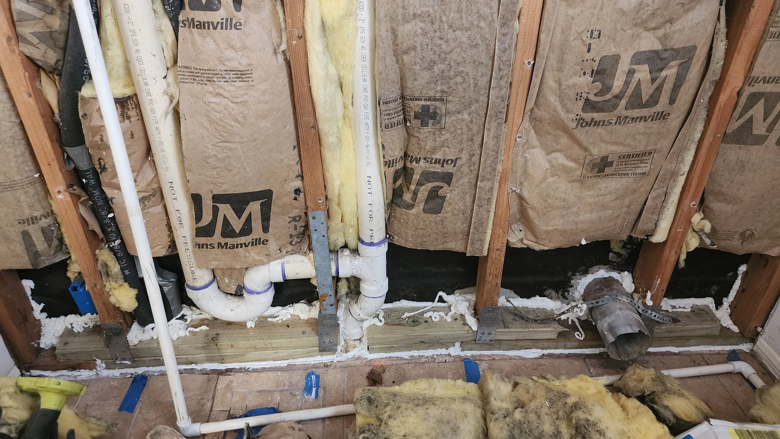 leak damaged the bottom plate of the frame behind the wall. Bottom plate was replaced with pressure treated lumber and sealed with spray foam. Water softener plumbing repaired.  