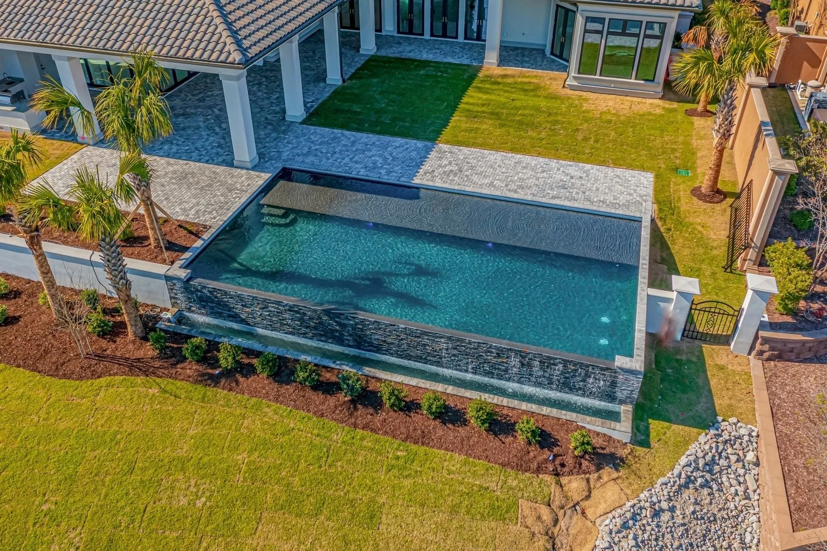About — Quality Pools & Spas, Landscape & Design