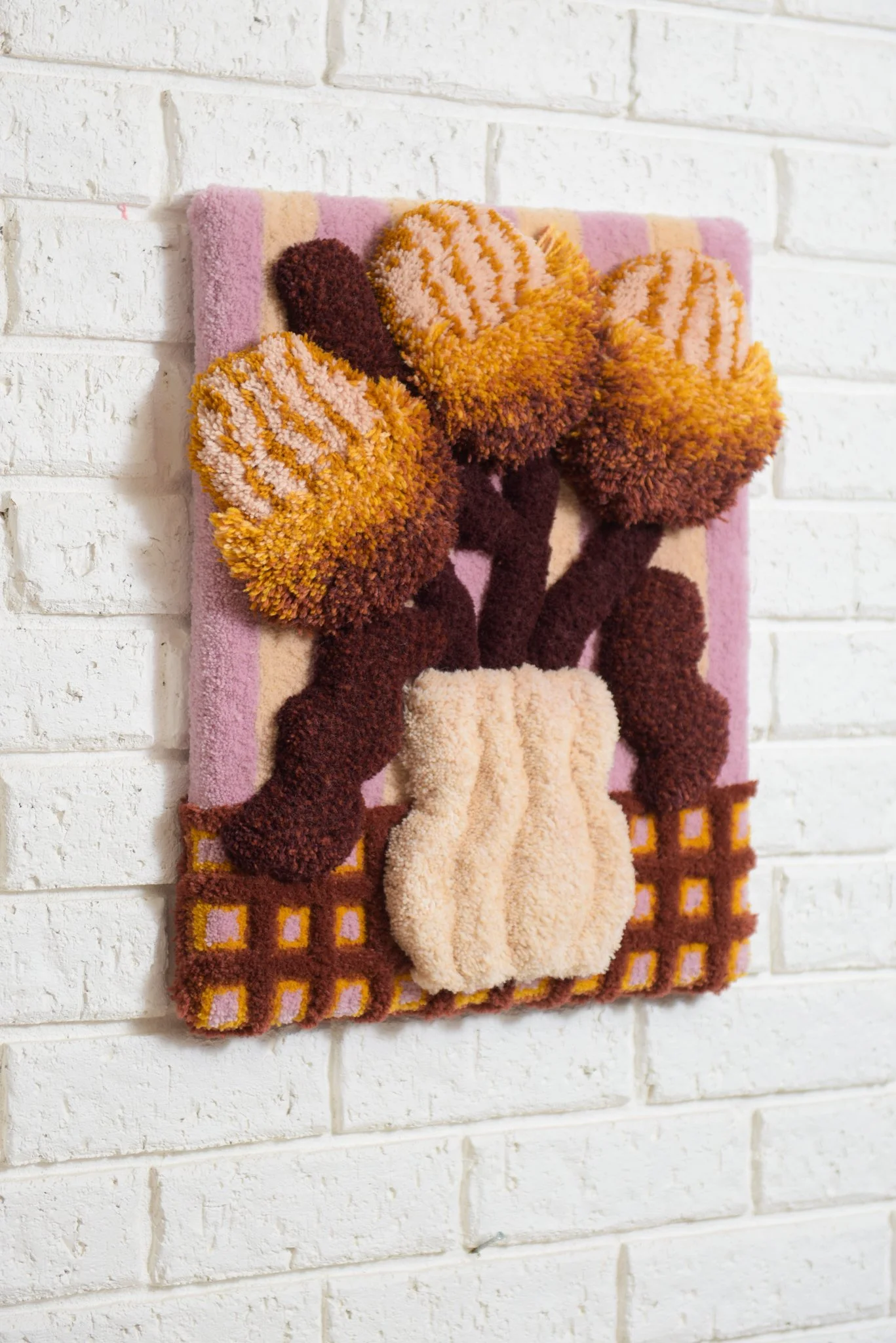 OlgaZwart_Loop_LAB_Golgen_Banksias_on_Mauve_Wool_44cmx53cm-1.jpg