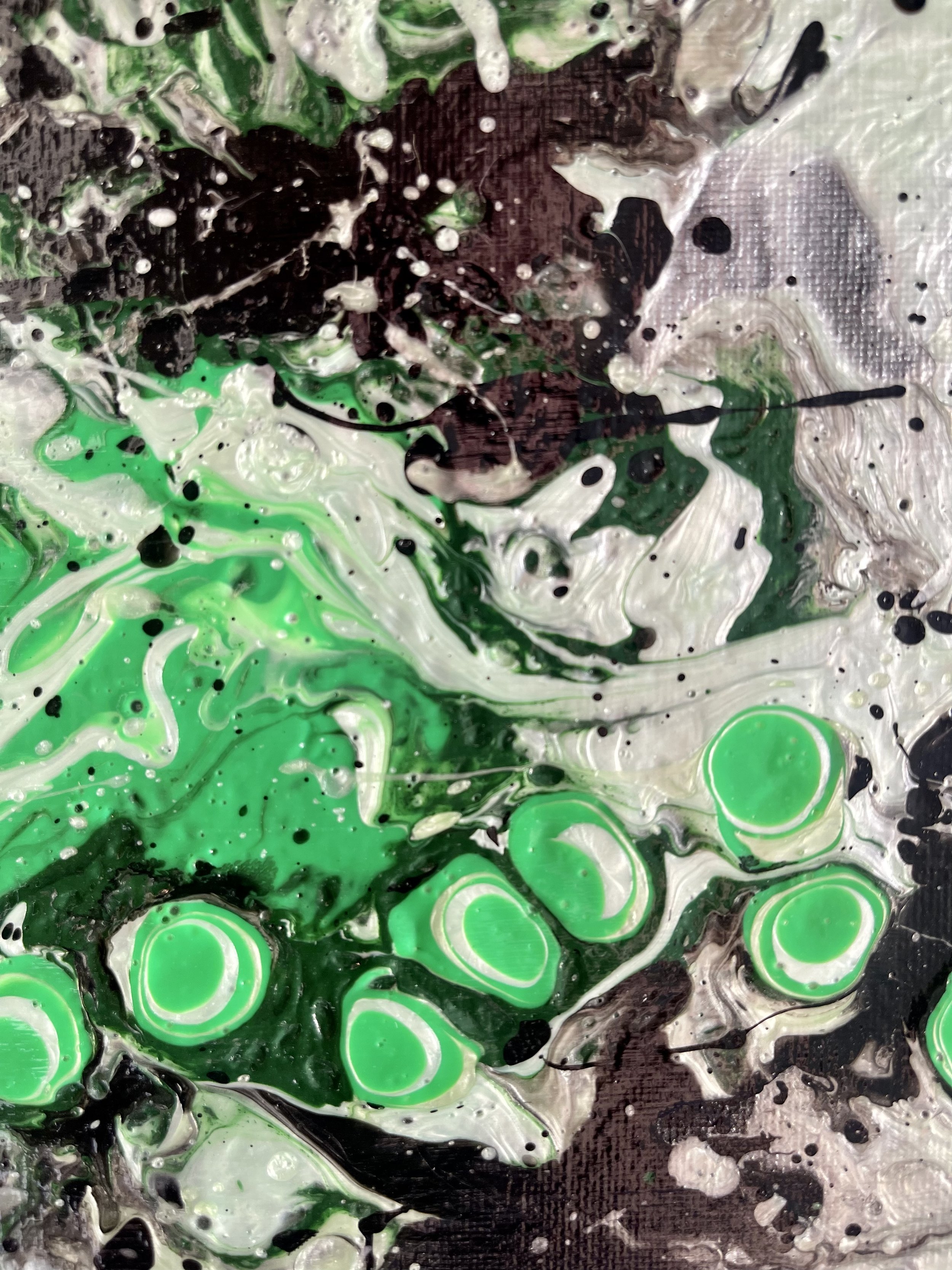 Muted black, dark and metallic mint greens are spearheaded by a powerful presence of lime green and white in Demagogue.