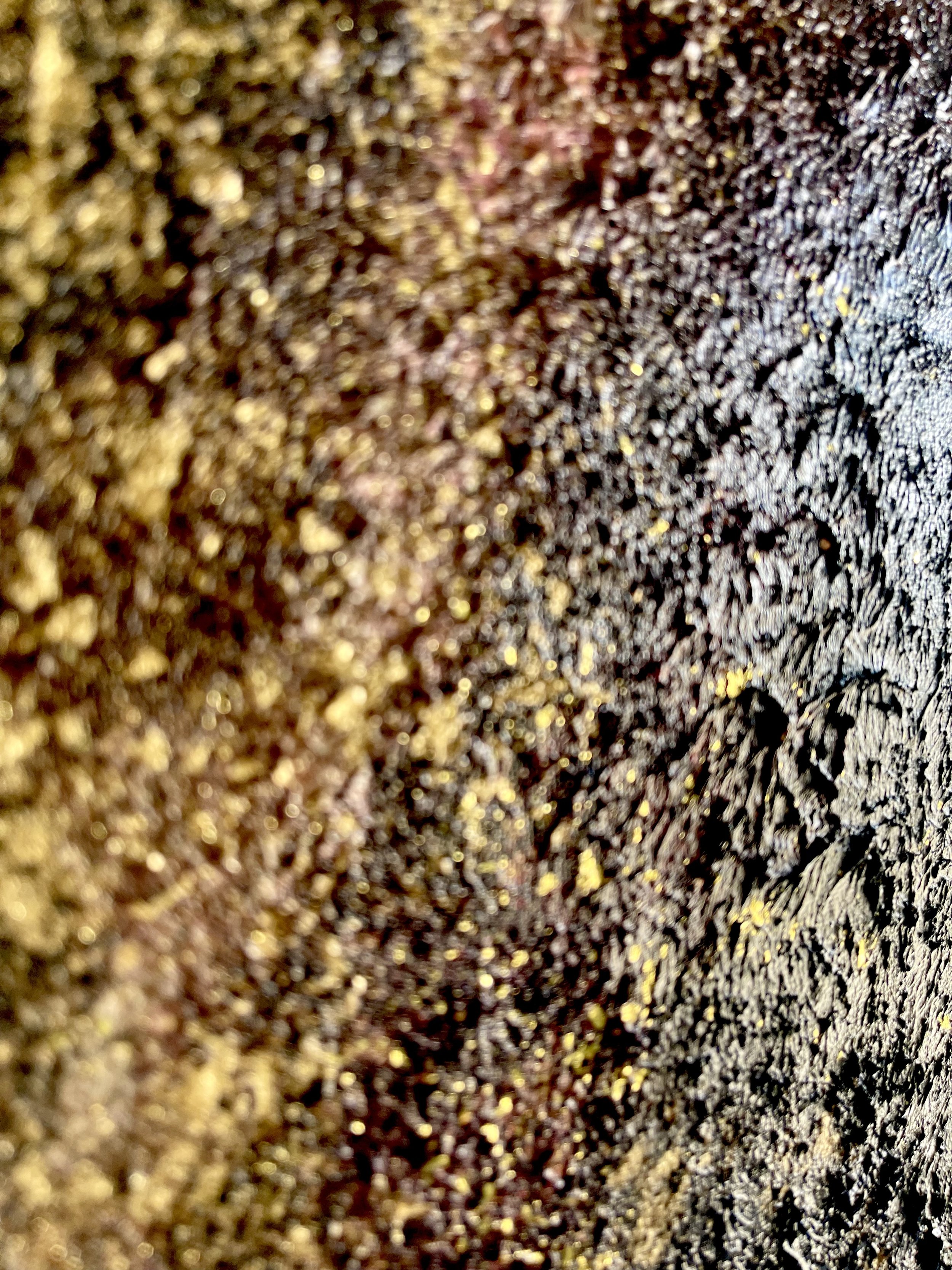 Confined onto a relatively small canvas, black space launches viewers into a heavily textured aurora with deep reds, oranges, and shimmering hot gold to encapsulate the depth of our existence.