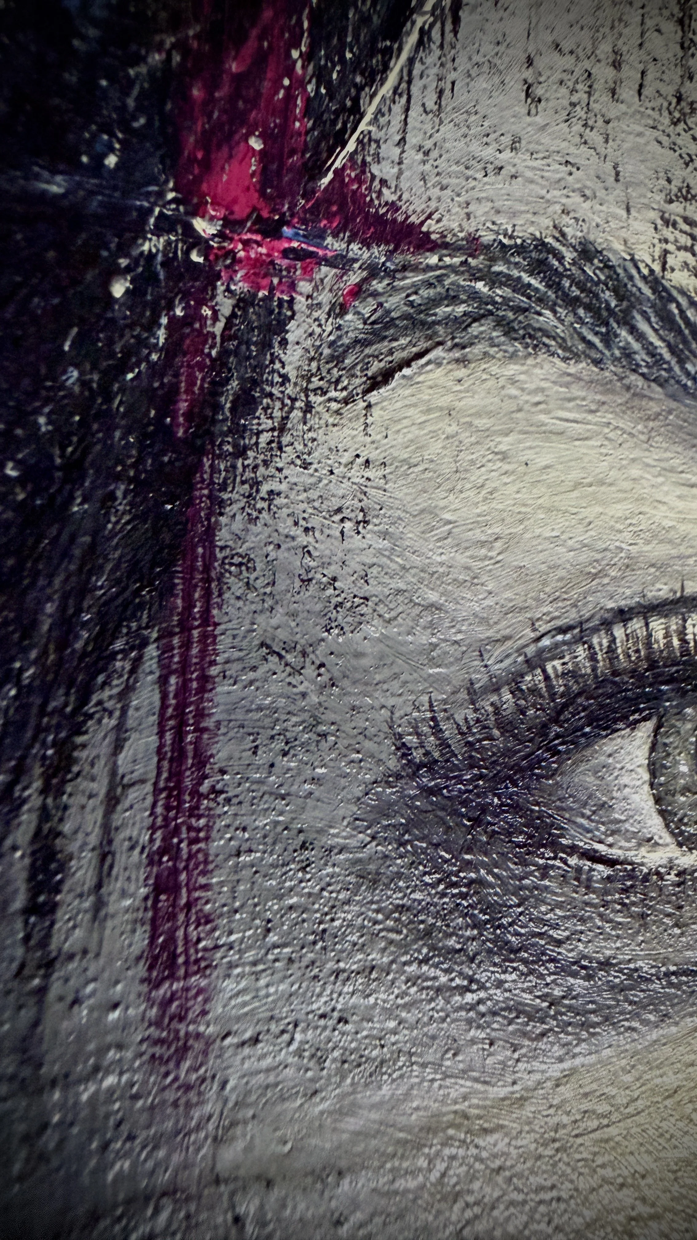 She watches something slipping away, like a dream. Butterflies rest in her hair, fragile and alive against her reserved manner, signs of a still warm and fluttering spirit.