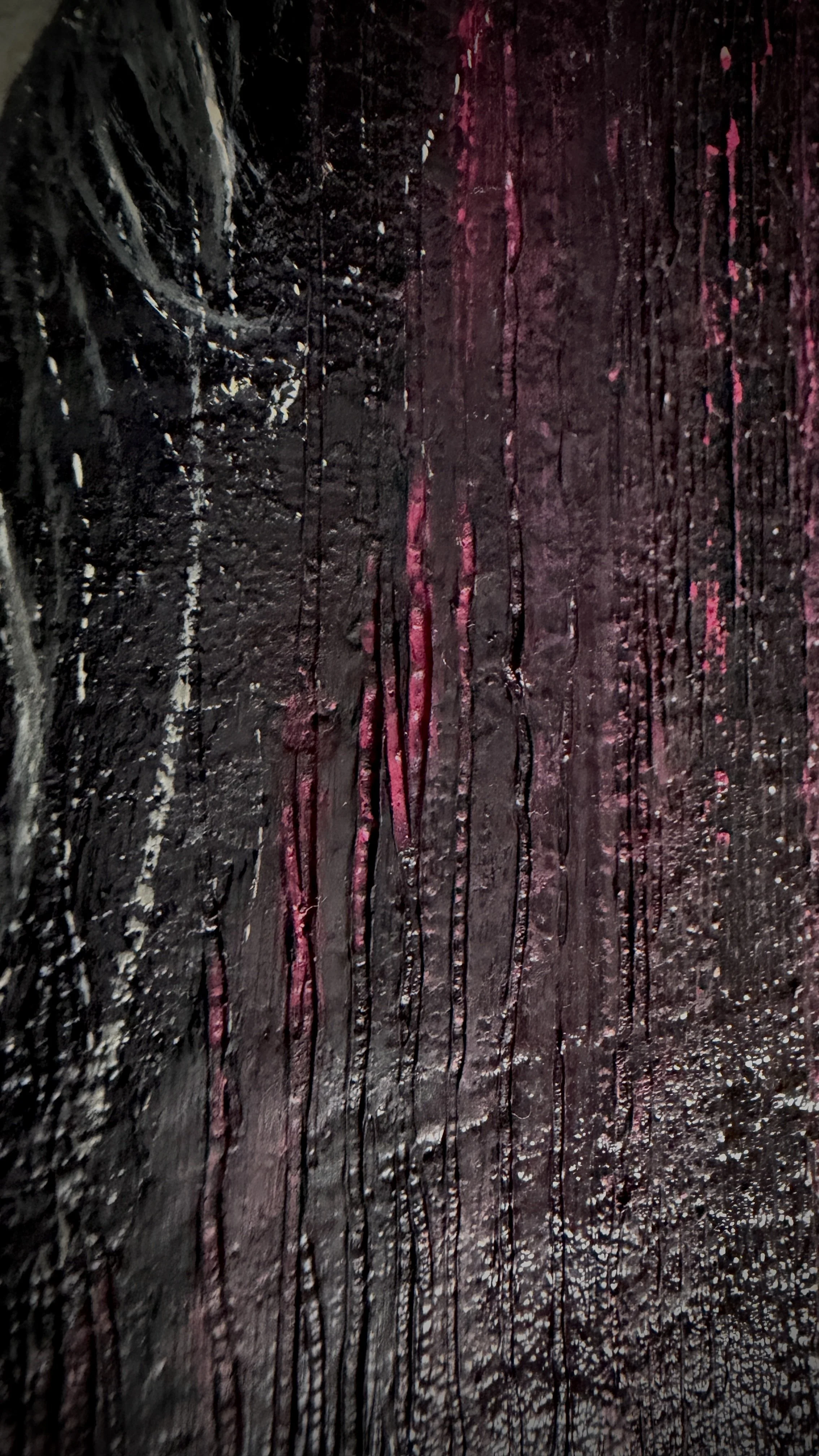 She watches something slipping away, like a dream. Butterflies rest in her hair, fragile and alive against her reserved manner, signs of a still warm and fluttering spirit.