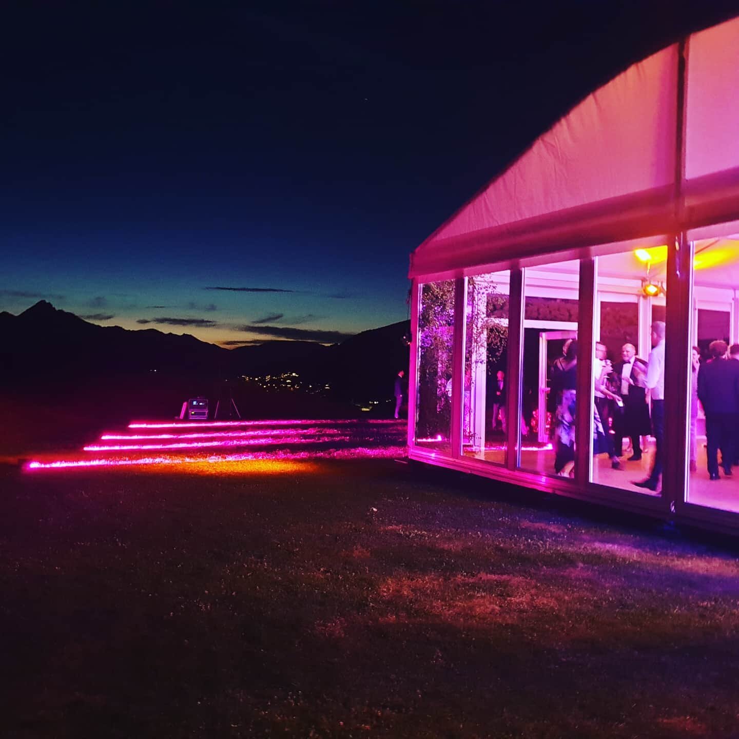 Nothing like a bit of pink lighting just as the sun sets. Views from our new glass marquee at Tussock Point.

Design by @aftertherockweddings 
Lighting by @tomtomproductionsnz 
#queenstownvenue #tussockpoint #queenstownweddings