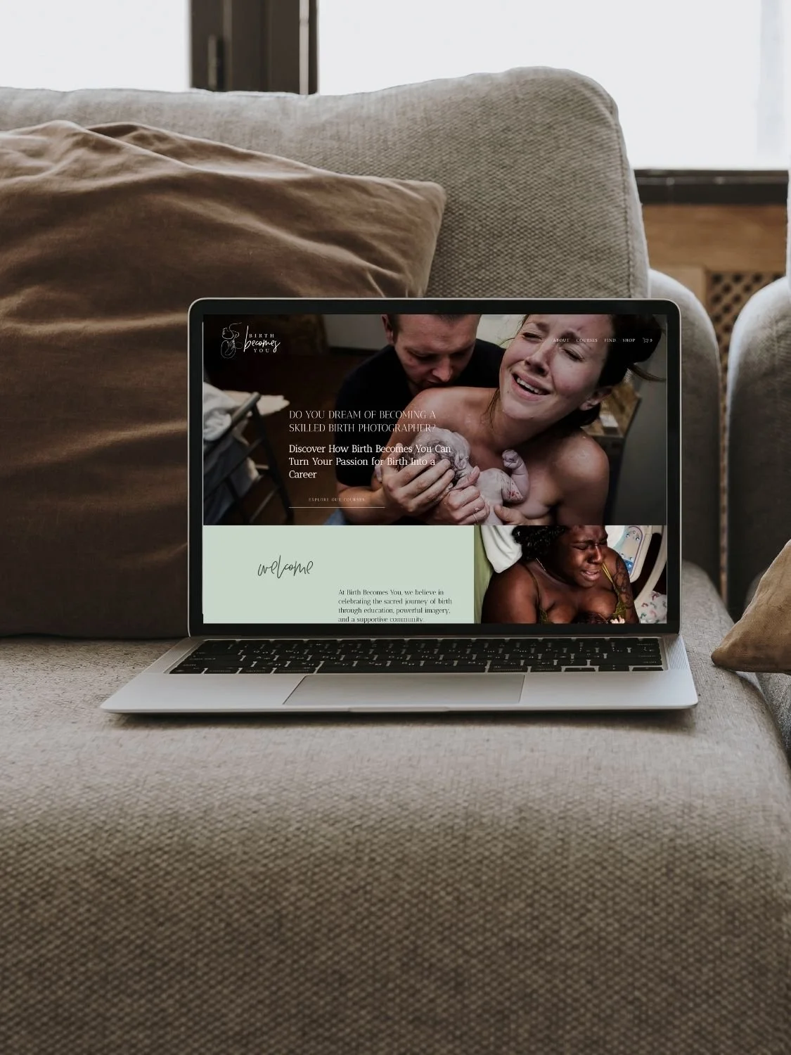 laptop open on a couch with educator website