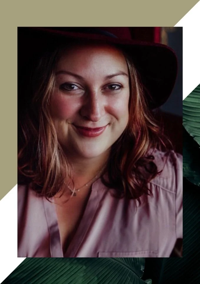 headshot of birth doula looking at camera from shoulders up smiling