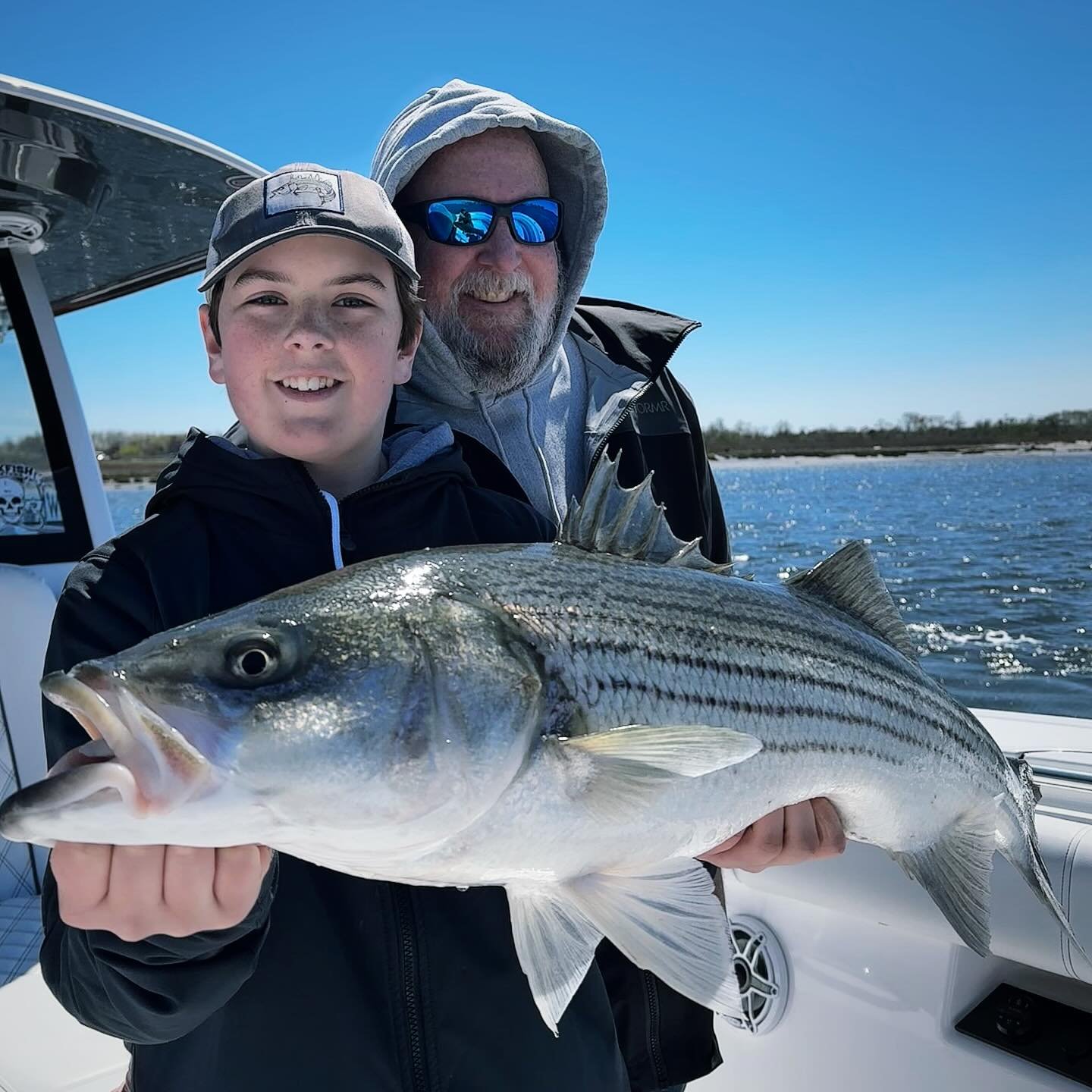 4/23/24: This afternoon we had @mnhtn2mtk, his son little Mike &amp; friends on a windy day bass charter. Conditions weren't easy with gusts to 30 but the guys fished hard to find fish that were chewing and everyone caught. We even saw an Osprey figh