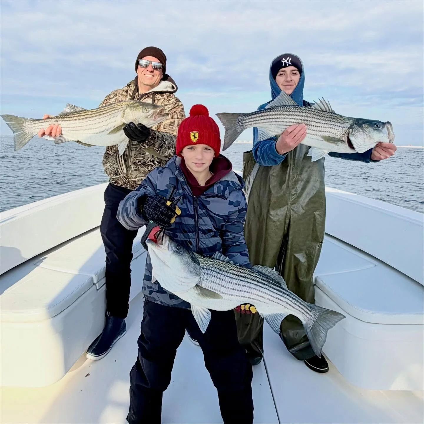 Another great trip today with Curtis &amp; friends today. We had to do some searching but once we got the call about a huge school of bunker it was game on! (thnx Brian) Non stop catching on swim shads &amp; live bunks 🤘