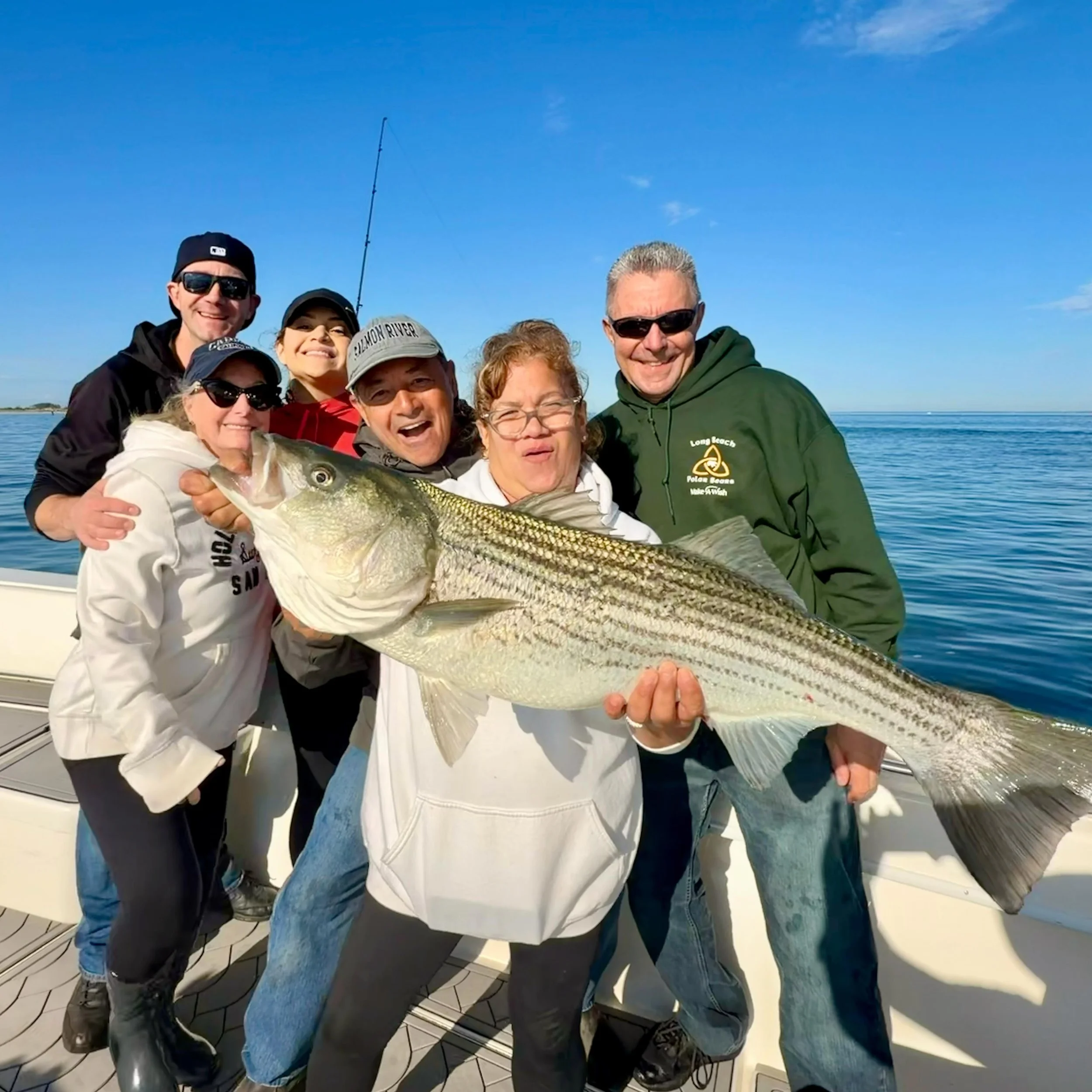 So big Sid thought he was babysitting his grandkids today &amp; instead got a surprise 70th birthday party Rockfish style -catching the 1st &amp; biggest bass of the day! Fun morning watching big bass inhale live bunker close to home. Happy birthday 