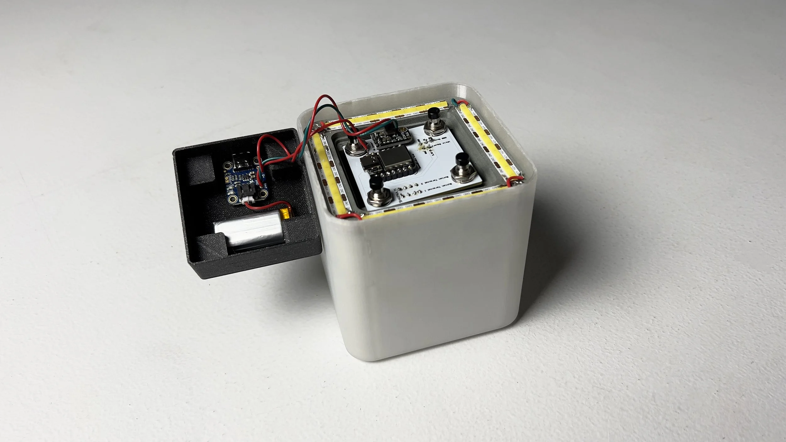 Pictured is the bottom facing assembly, consisting of the downward facing strip lights and the brain and battery.