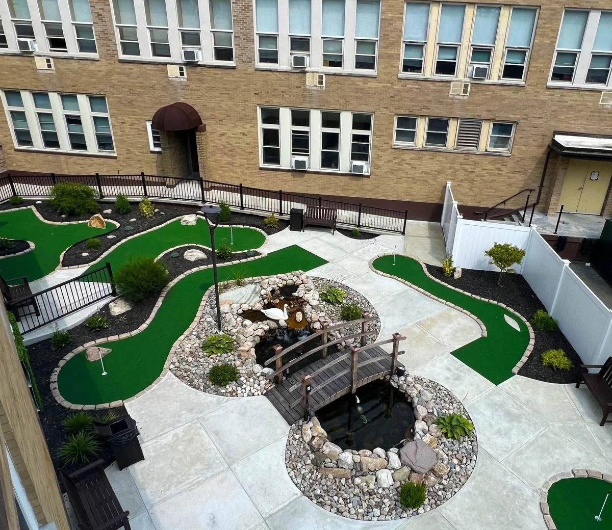 Courtyard with miniature golf and pond
