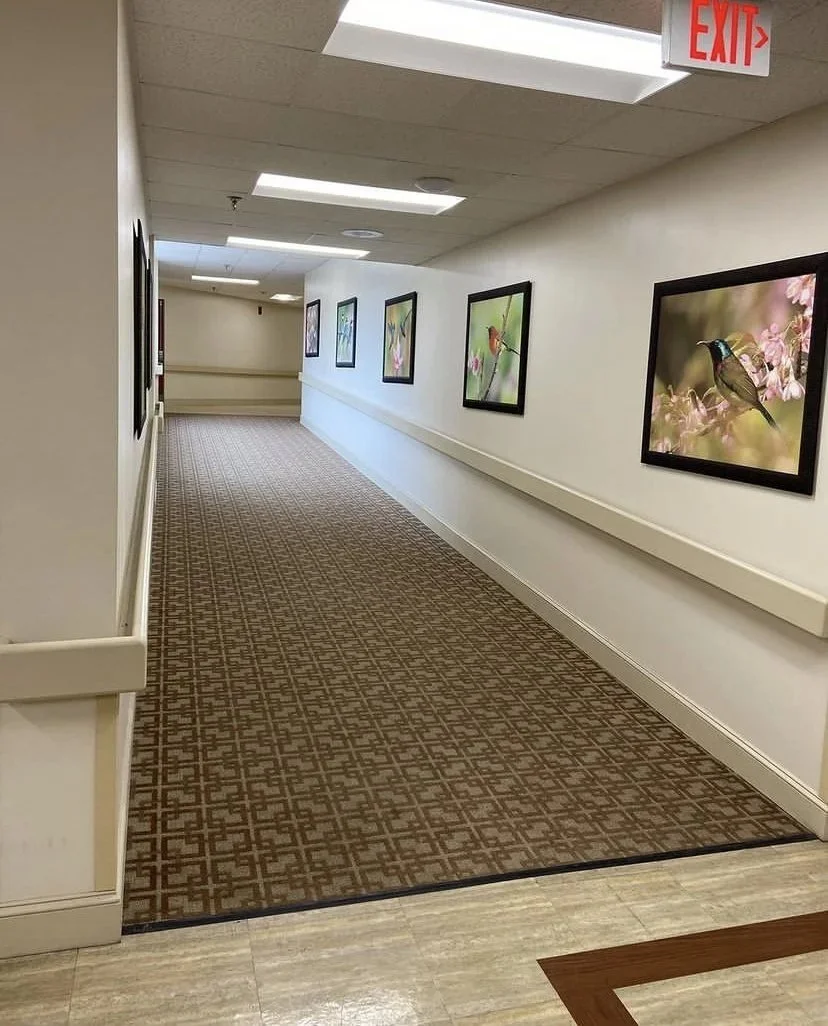 Hallway with framed artwork