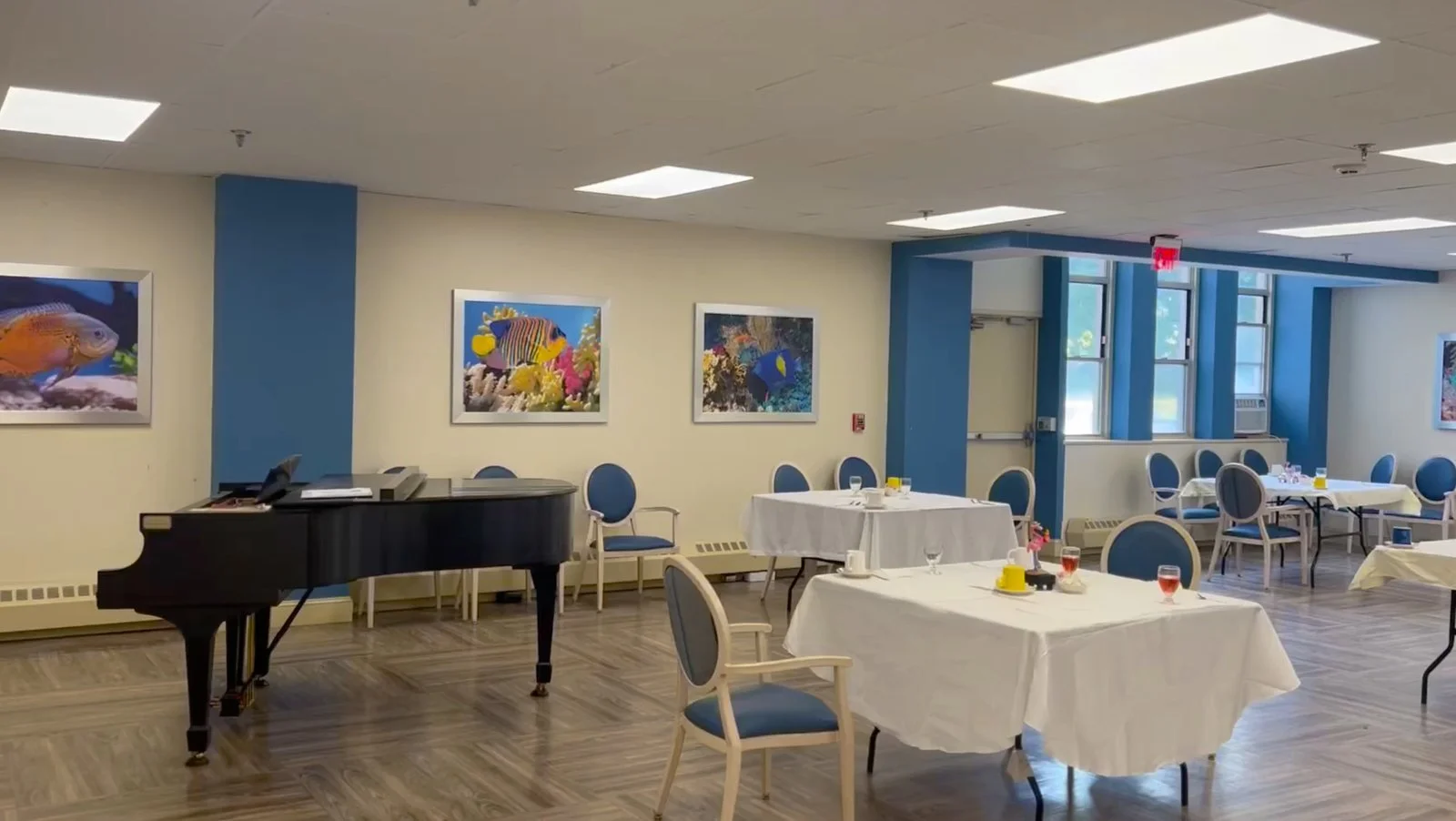 Dining room with piano and tables