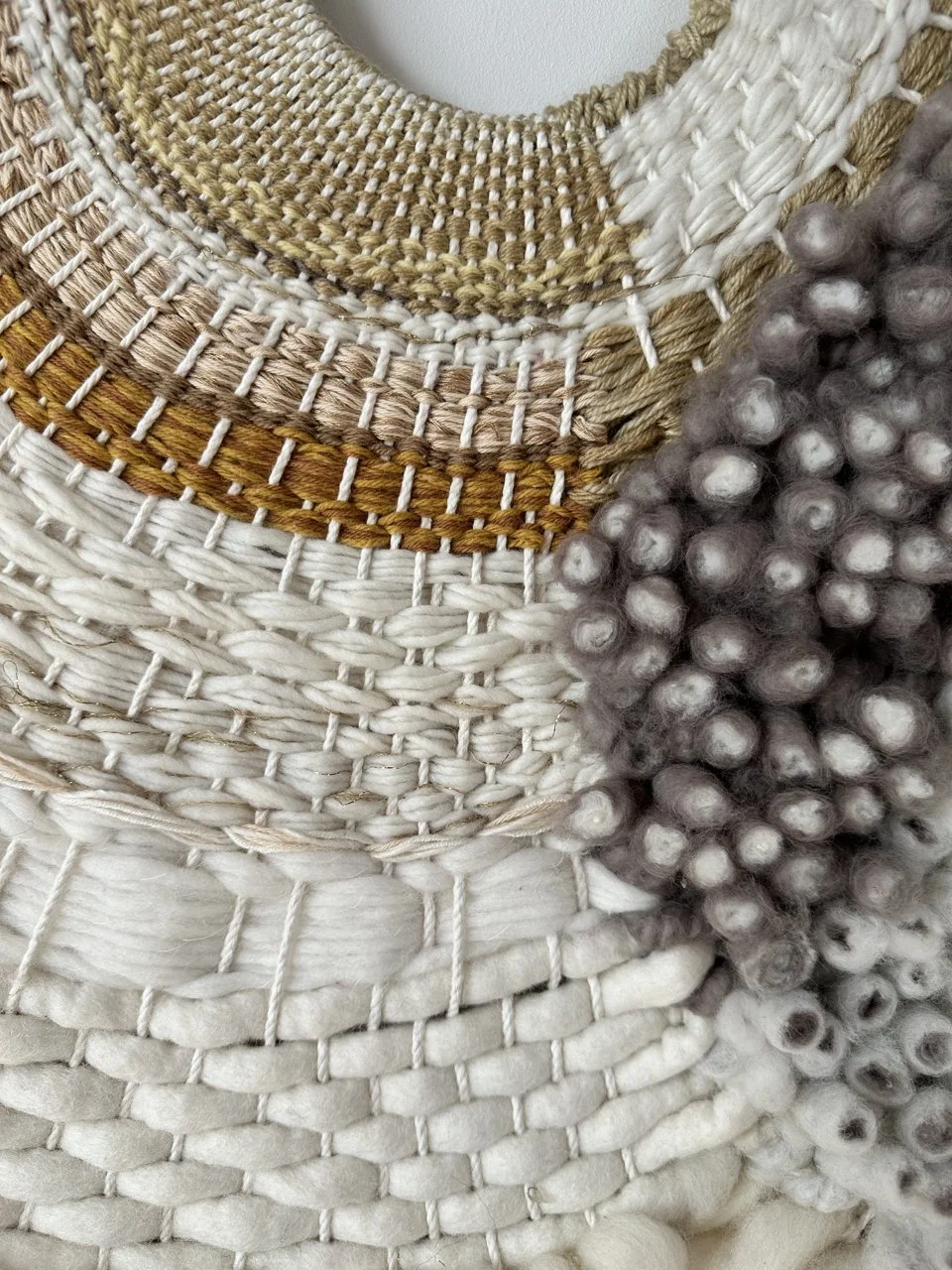 picture of round handwoven wallart wallpiece wallhanging wool and cotton modern weaving